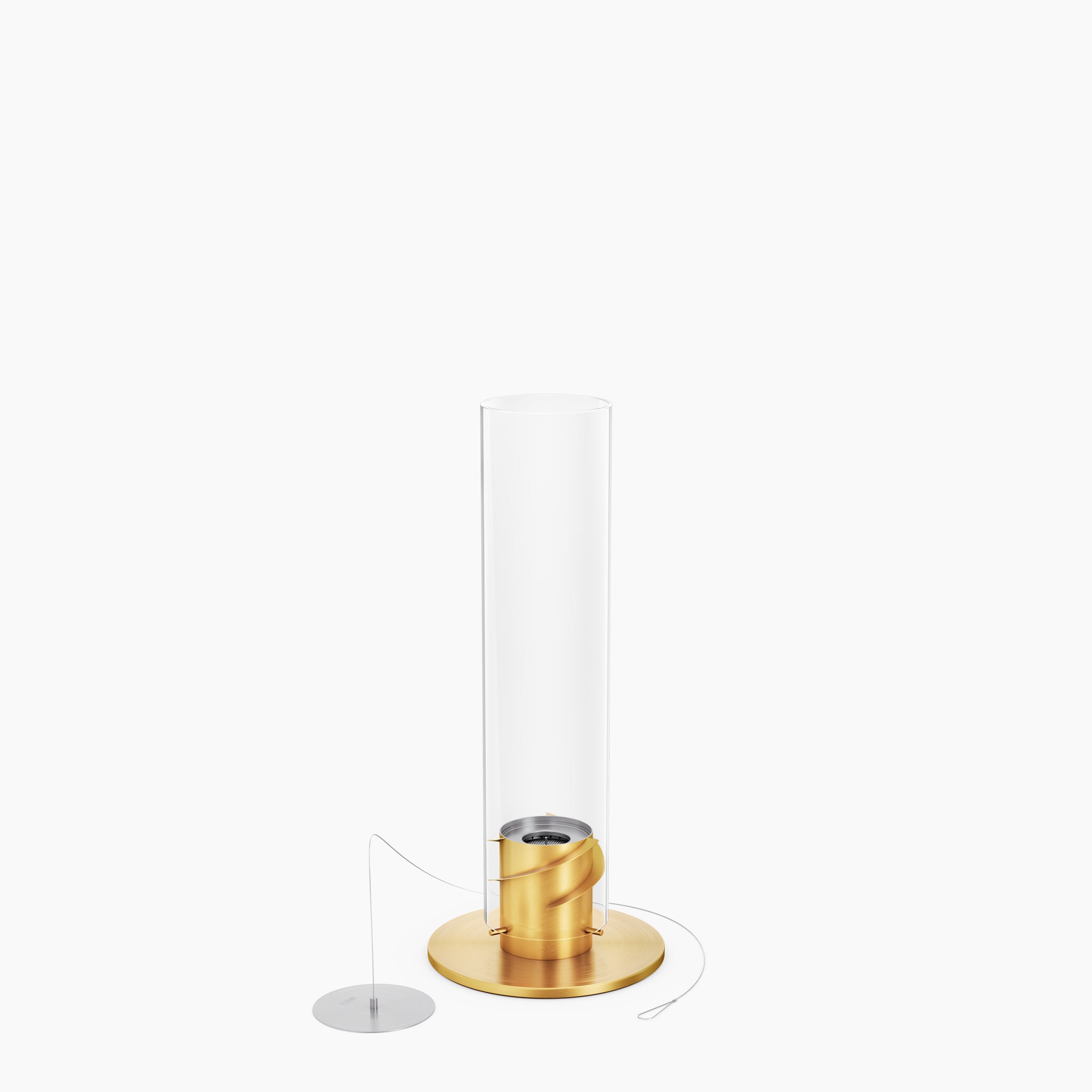 A modern Höfats SPIN 900 Tabletop Fireplace Gold showcasing a brass and decorative glass cylinder with a minimalist design on a white background.