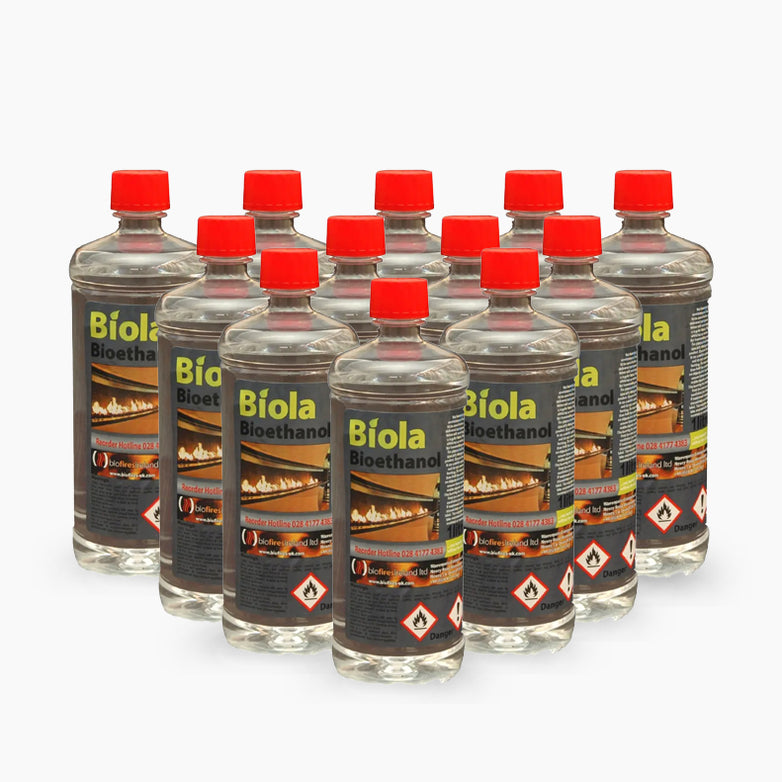 A group of twelve clear bottles, part of the "Bioethanol Liquid 12 Pack for Höfats SPIN 900, 1200 & 1500," with red caps arranged in three rows, made from renewable raw materials.