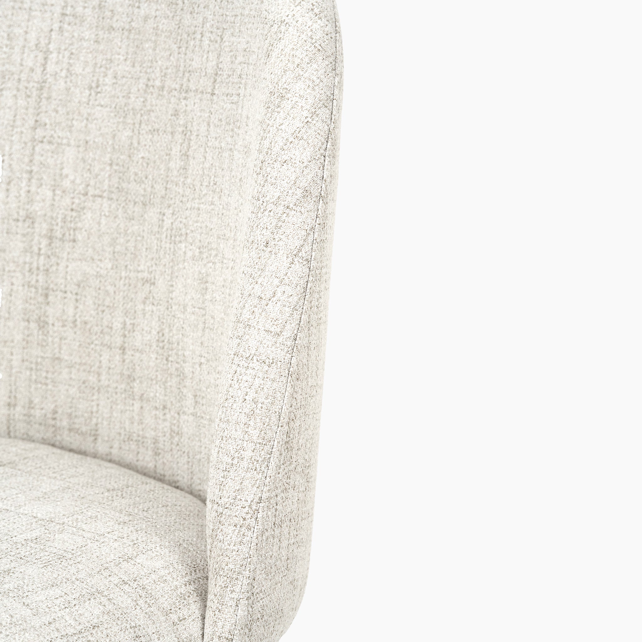 Close-up of a Turi Pebble Linen Mix and Black Metal Bar Stool, highlighting its light gray fabric with a curved backrest, contemporary fine texture, and stitching details.