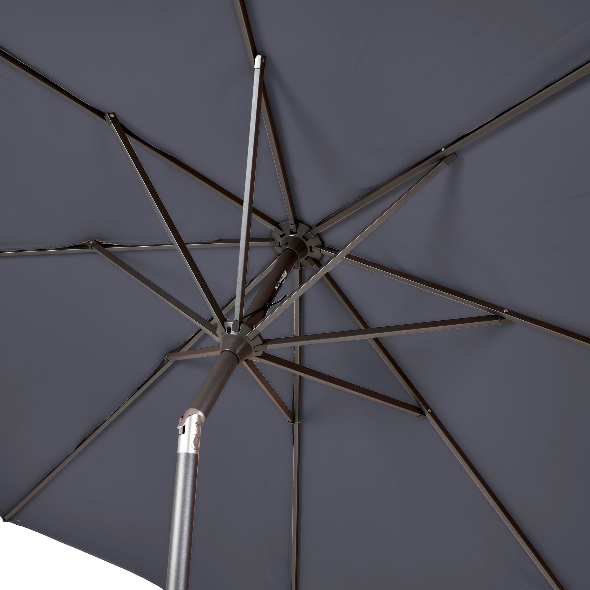 View from beneath the durable Pacific Lifestyle - Riva 3m Round Anthracite Parasol, highlighting its robust construction with metal spokes and a powder-coated aluminium frame for style and UV protection.