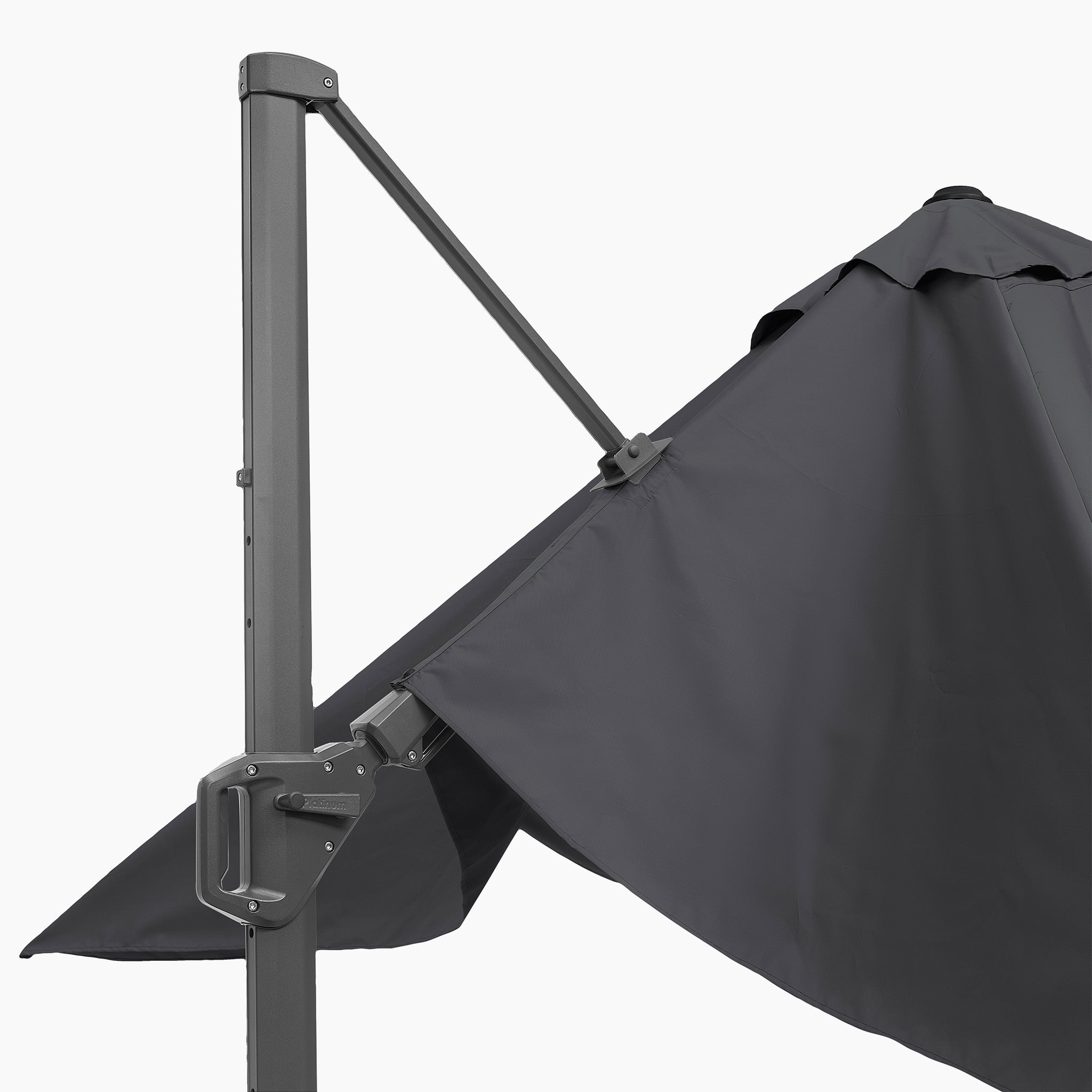 Close-up of the Pacific Lifestyle Challenger T2 3.5m x 2.6m Rectangular Cantilever Parasol in Anthracite, made from premium fabric with a crank handle on the pole. Its innovative double tilt system offers optimal sun protection against a plain background.