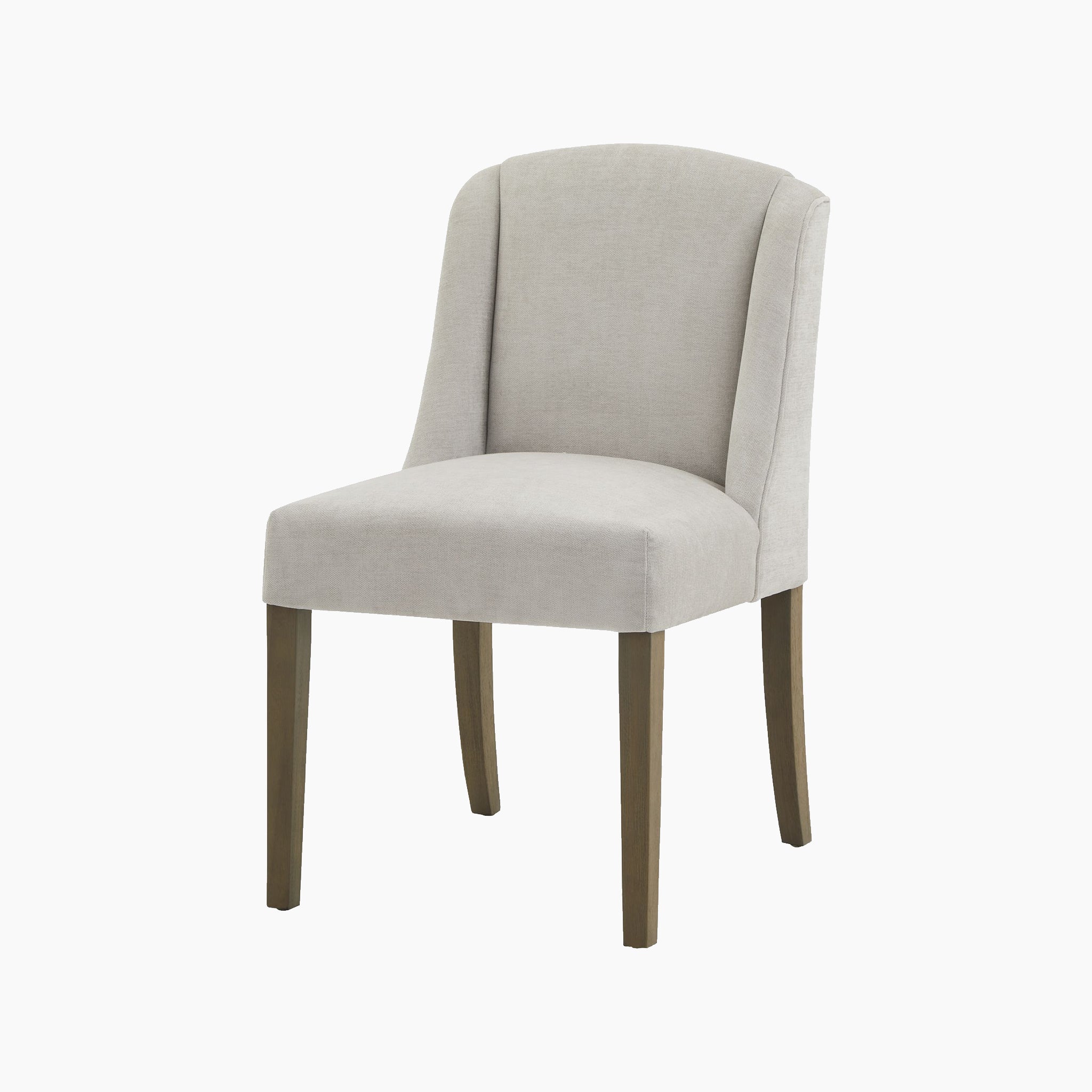 The Kingham Grey Dining Chair, featuring elegant rubberwood legs, sits gracefully against a white background.