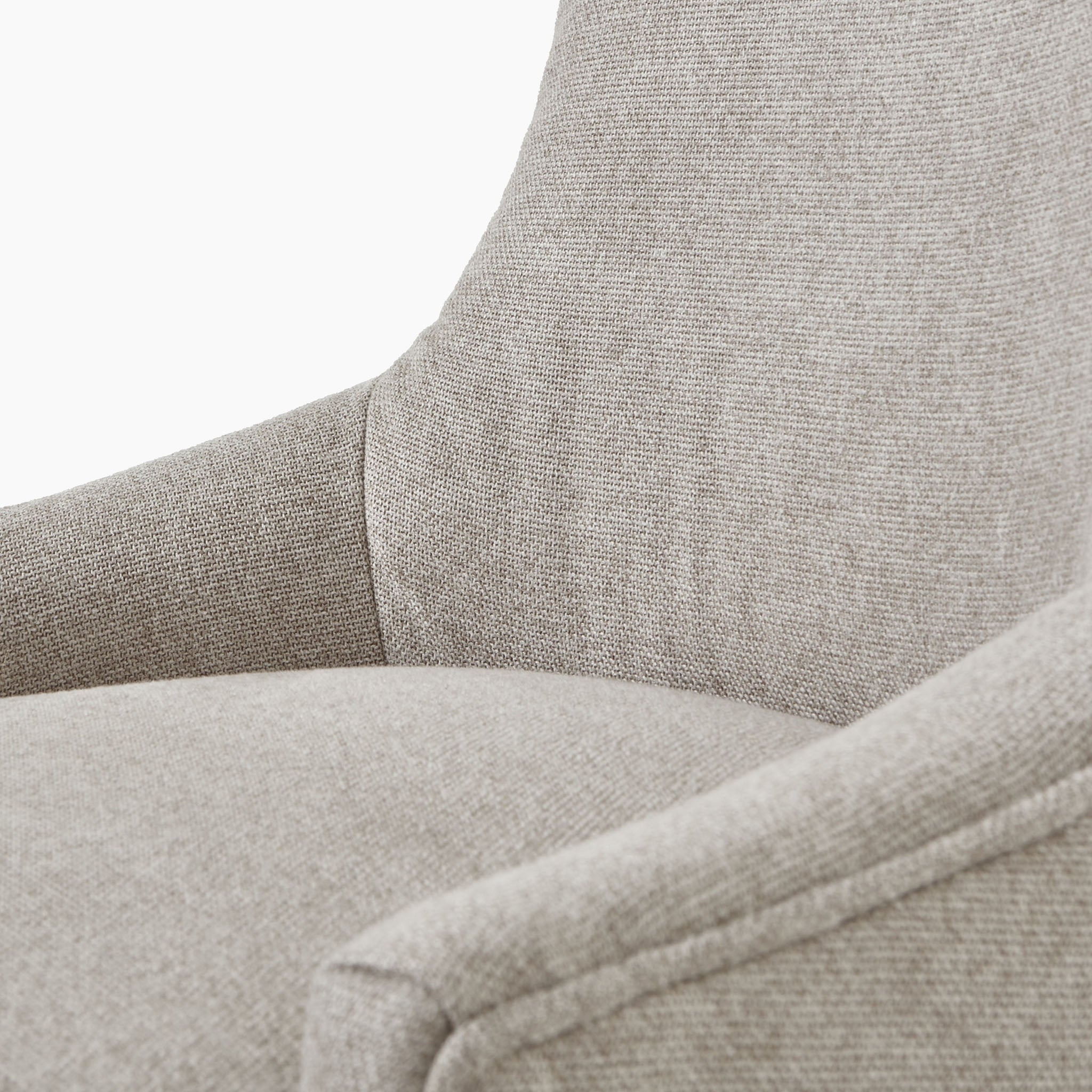 Close-up of the Brockham Oatmeal Twill Dining Chair, showcasing its textured beige upholstery and elegant rubberwood legs.