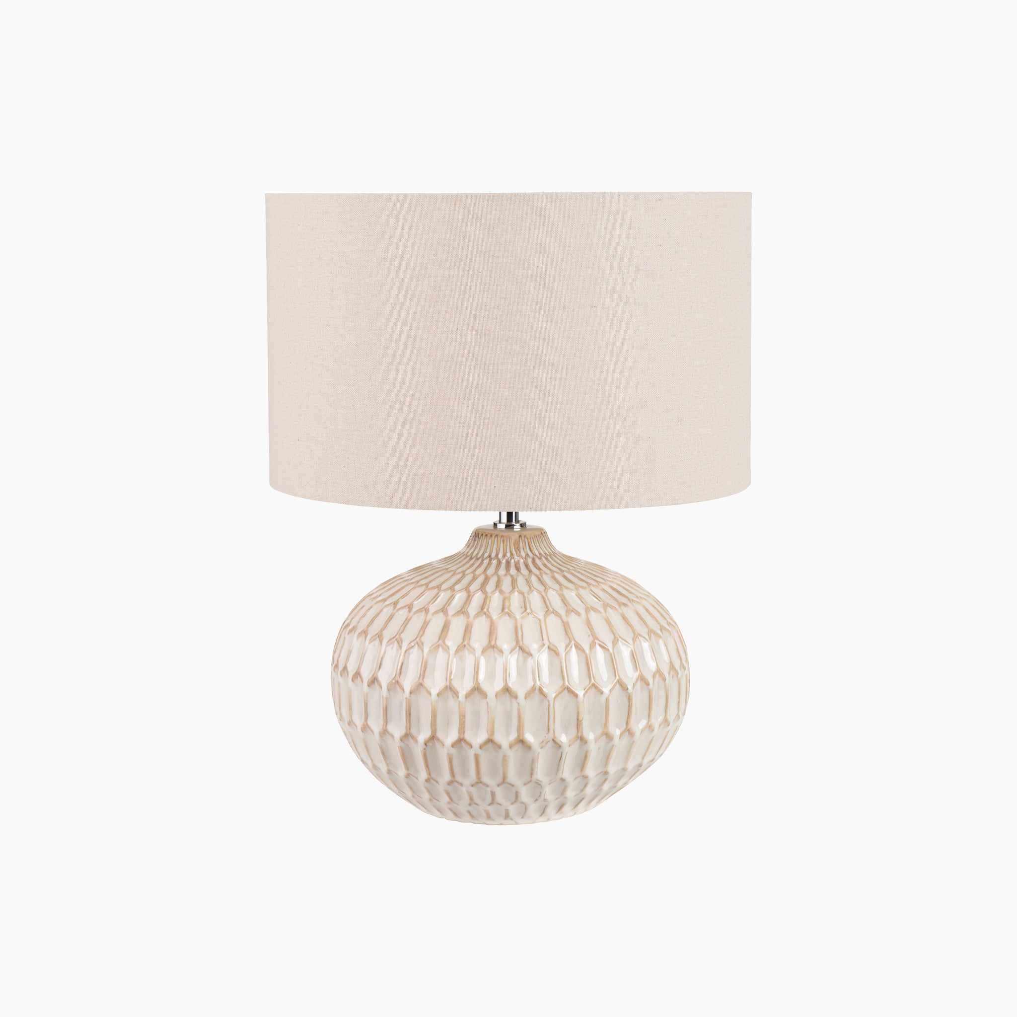 Cassius Warm White Textured Glazed Ceramic Table Lamp showcasing an Aztec pattern on its round base, complemented by a cylindrical linen lampshade.