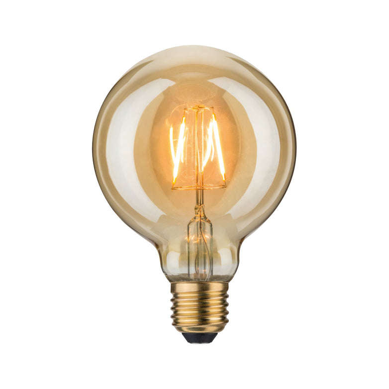 The Paulmann - Filament LED Globe Bulb 2.7W E27 Gold Glass is lit on a white background, highlighting the charm of its vintage all-glass design combined with energy-saving LED technology.