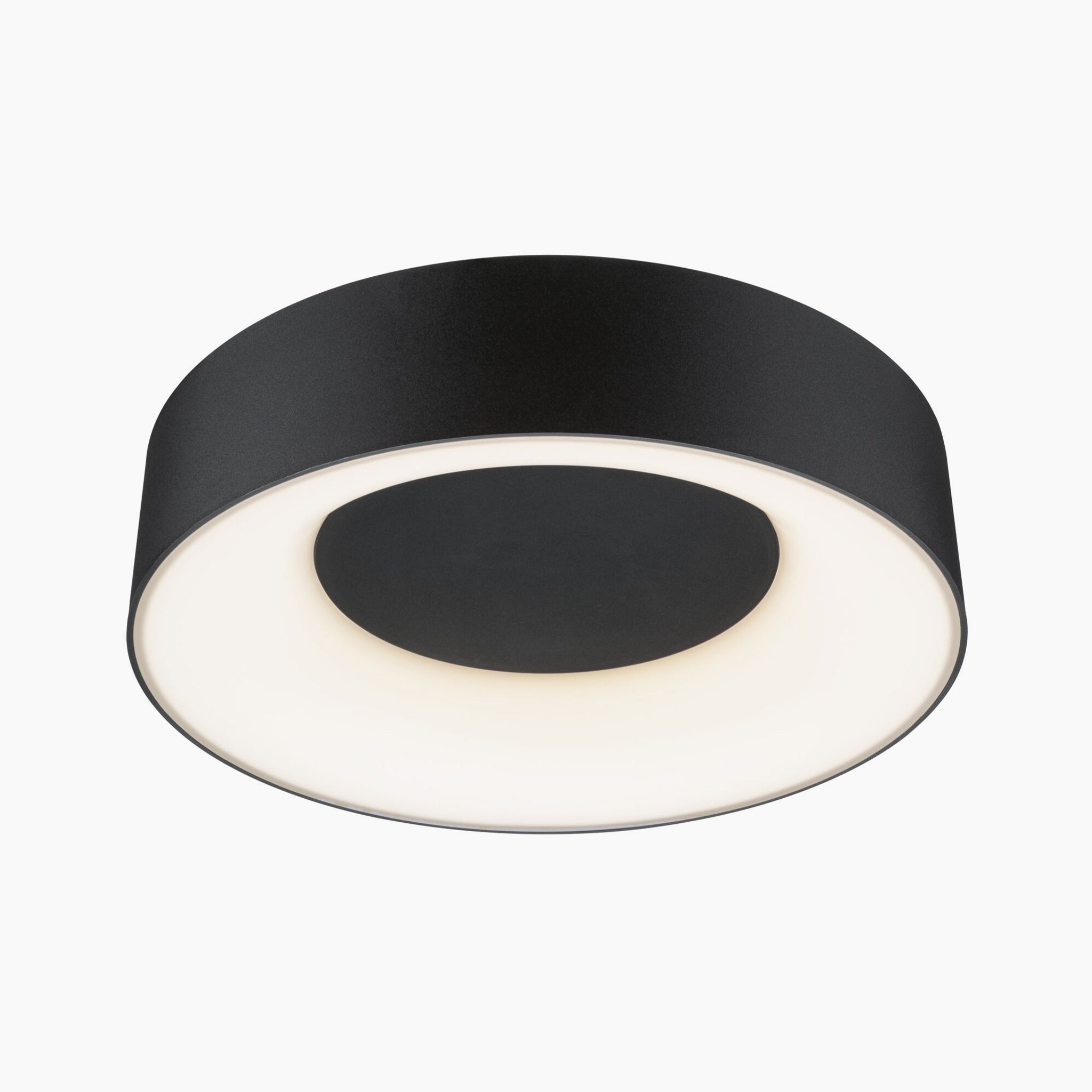 Introducing the Casca 18W LED Switch 1500lm Ceiling Light in Black Matt, a round and modern fixture featuring an illuminated white circular center that provides a unique lighting effect.