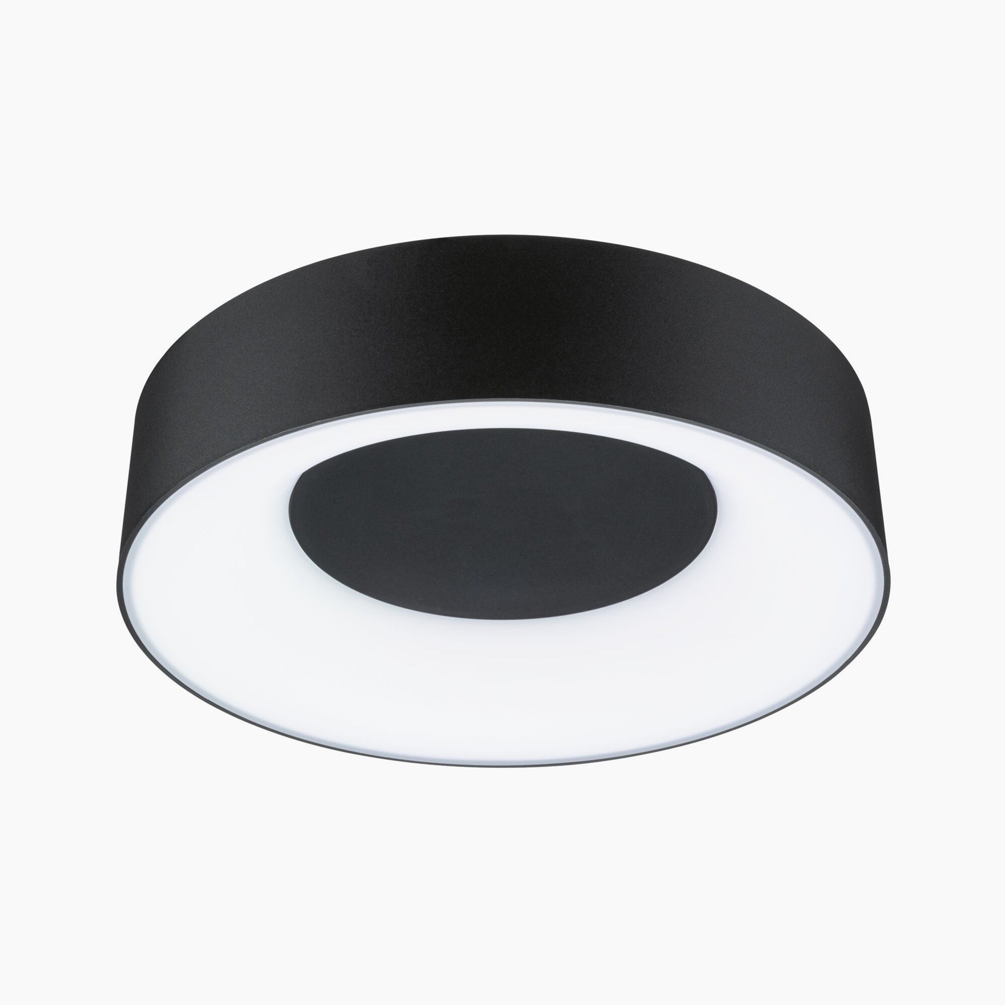 The Casca 18W LED Switch 1500lm Ceiling Light in Black Matt features a black circular design with a white illuminated center, casting an elegant light color against the white background.