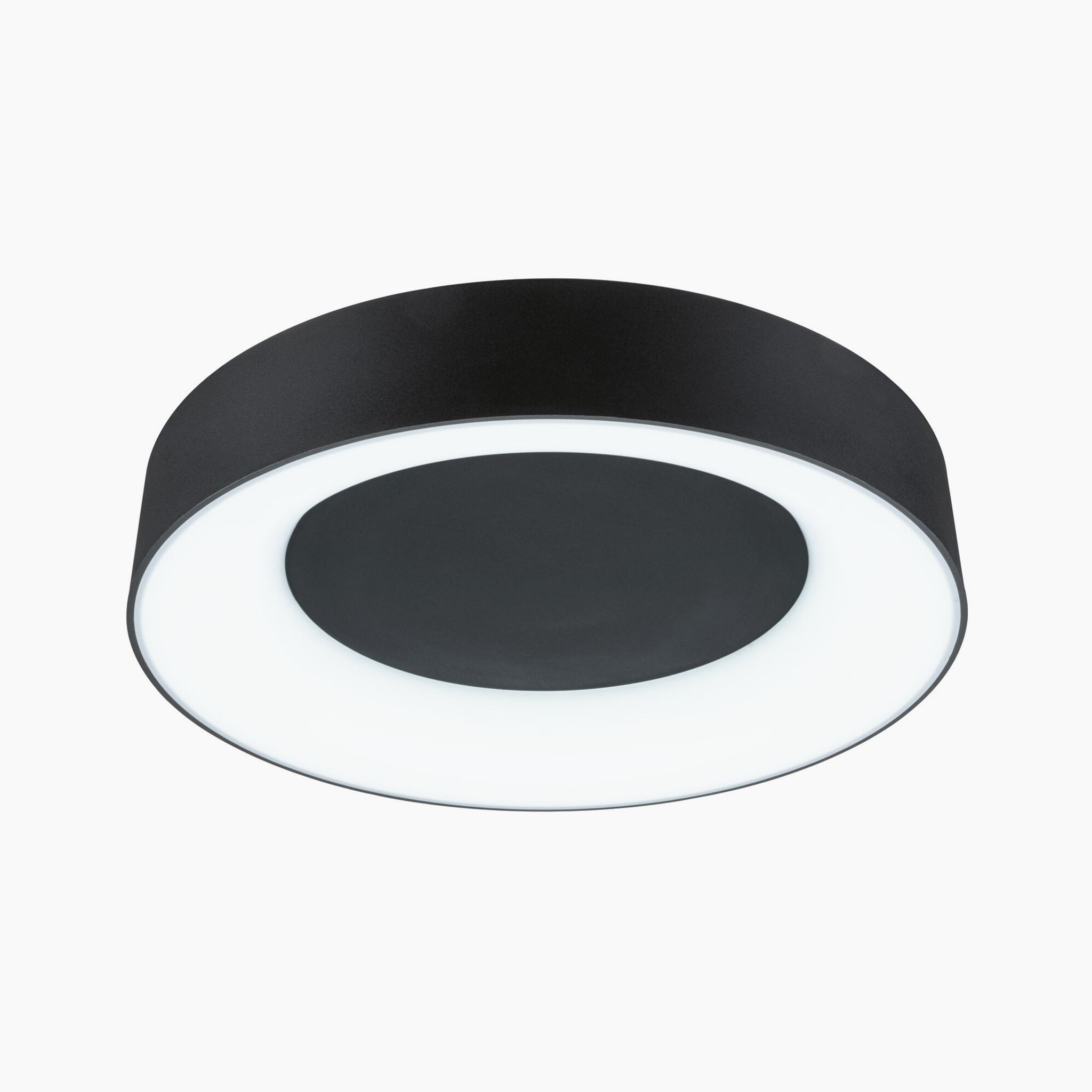 The Casca 25W LED Switch 2100lm Ceiling Light in Black Matt, with its sleek black circular design and white illuminated center, stands out beautifully against a white background. Its lighting effect enhances any space with an elegant ambiance, and the adjustable light color lets you customize the atmosphere to your liking.