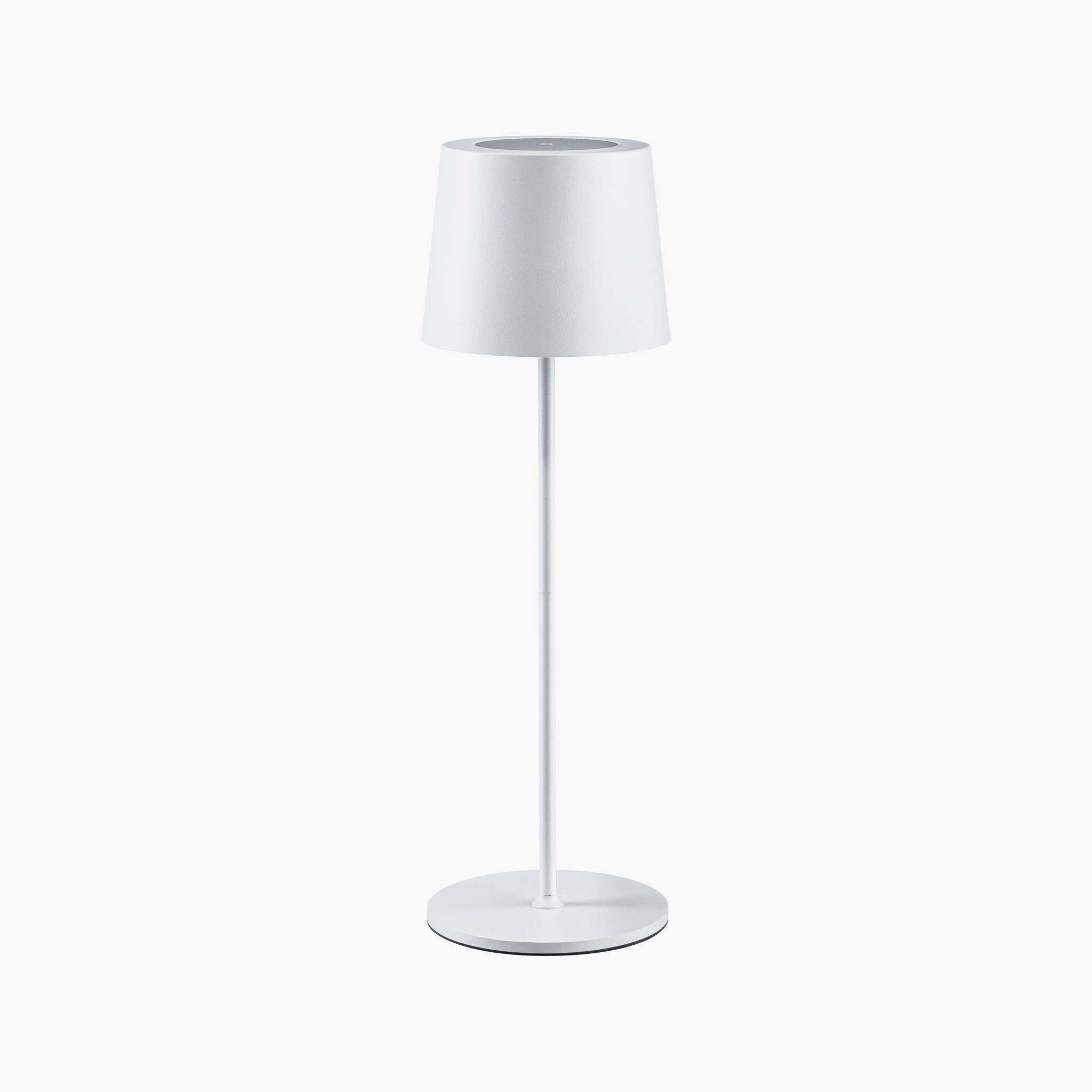 The Gilo 2.8W LED Mobile Dimmable Floor Lamp in White Matt is a sleek, modern luminaire with a cylindrical base and a cone-shaped lampshade, featuring USB-C touch dimming for effortless control. This portable, battery-powered table lamp is perfect for both outdoor and indoor lighting.