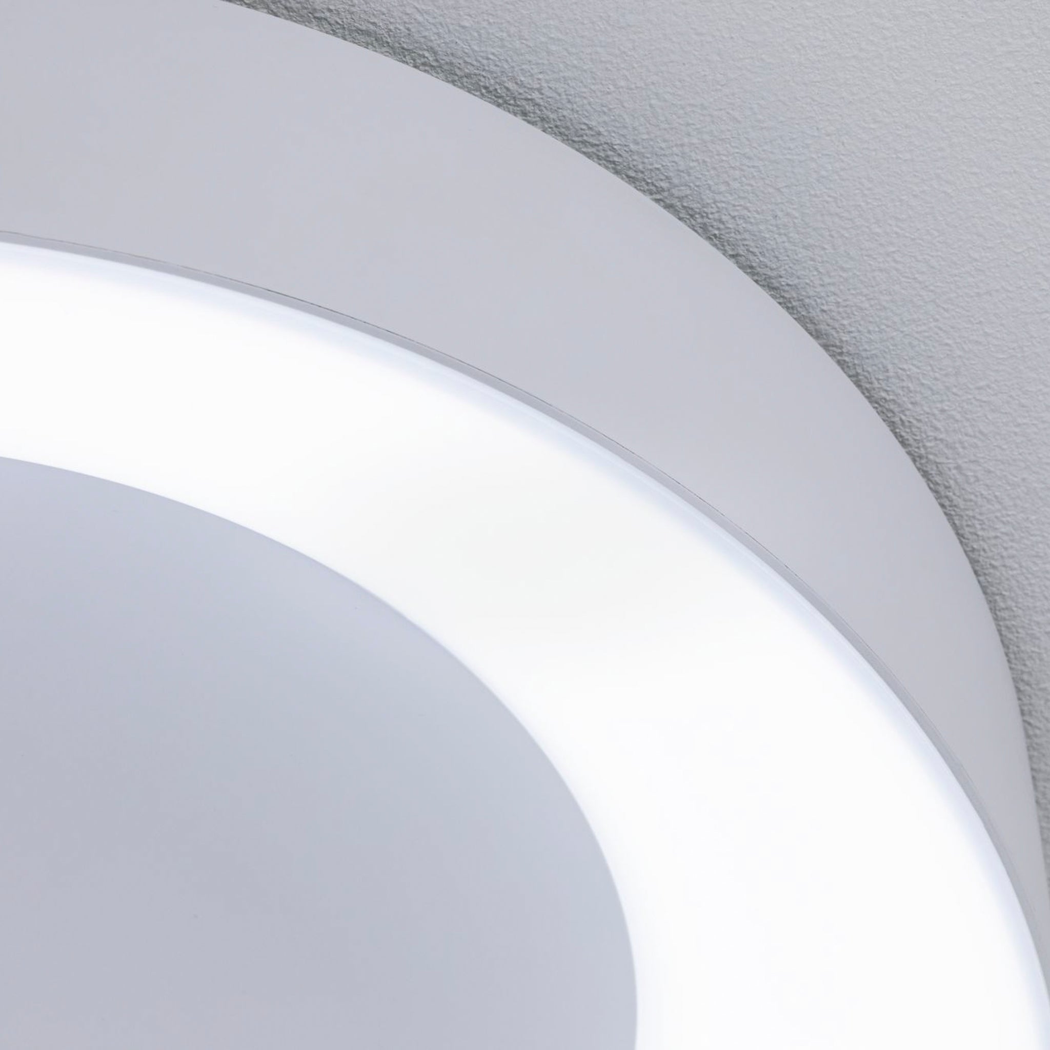 Close-up of the Casca 25W LED Switch 2100lm Ceiling Light in White, featuring a sleek, modern design and adjustable light colour.