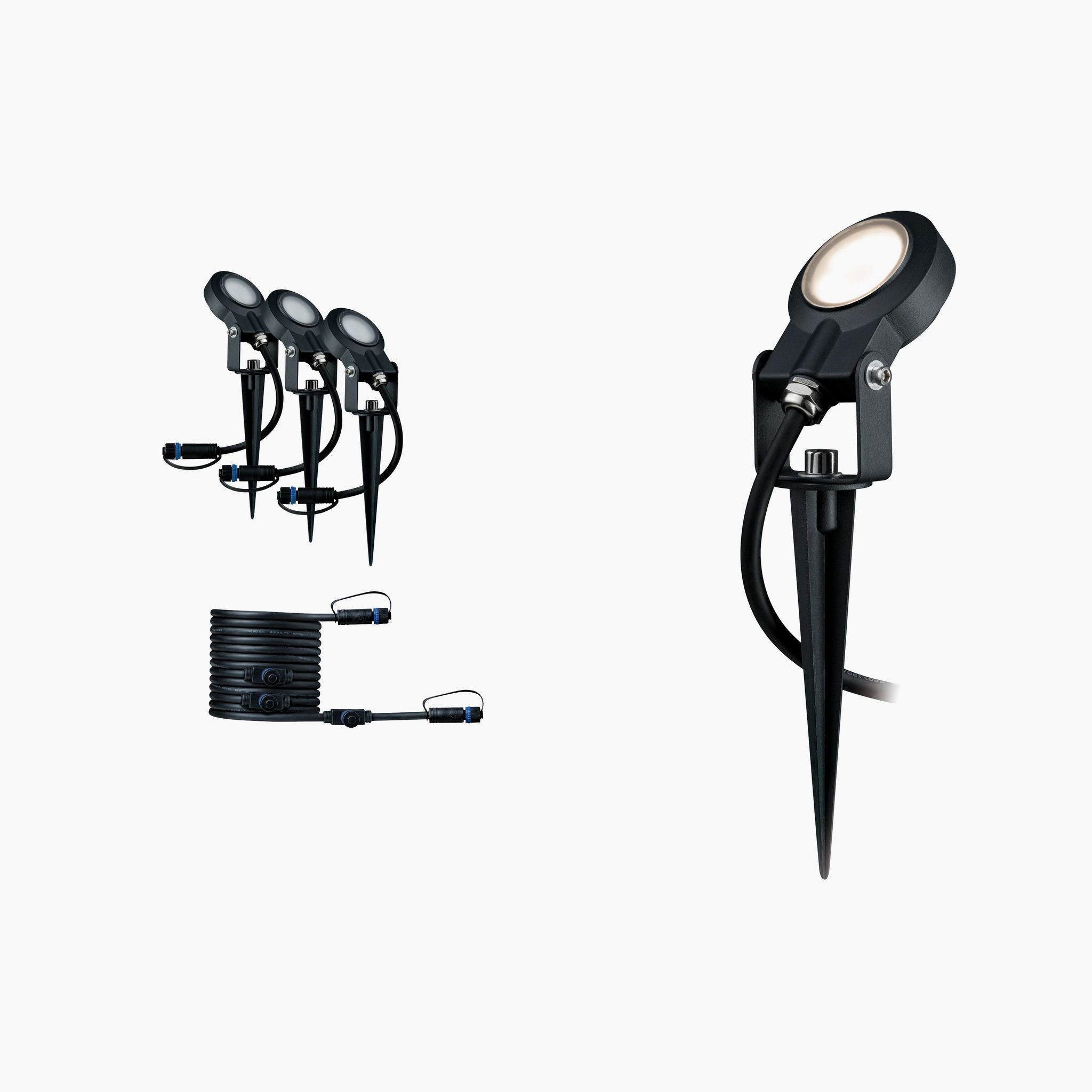 The Paulmann - Plug & Shine Outdoor Sting 18W LED Warm White Expansion Set in Anthracite features weather-resistant luminaires with stakes and electrical connectors, beautifully showcased against a white background.