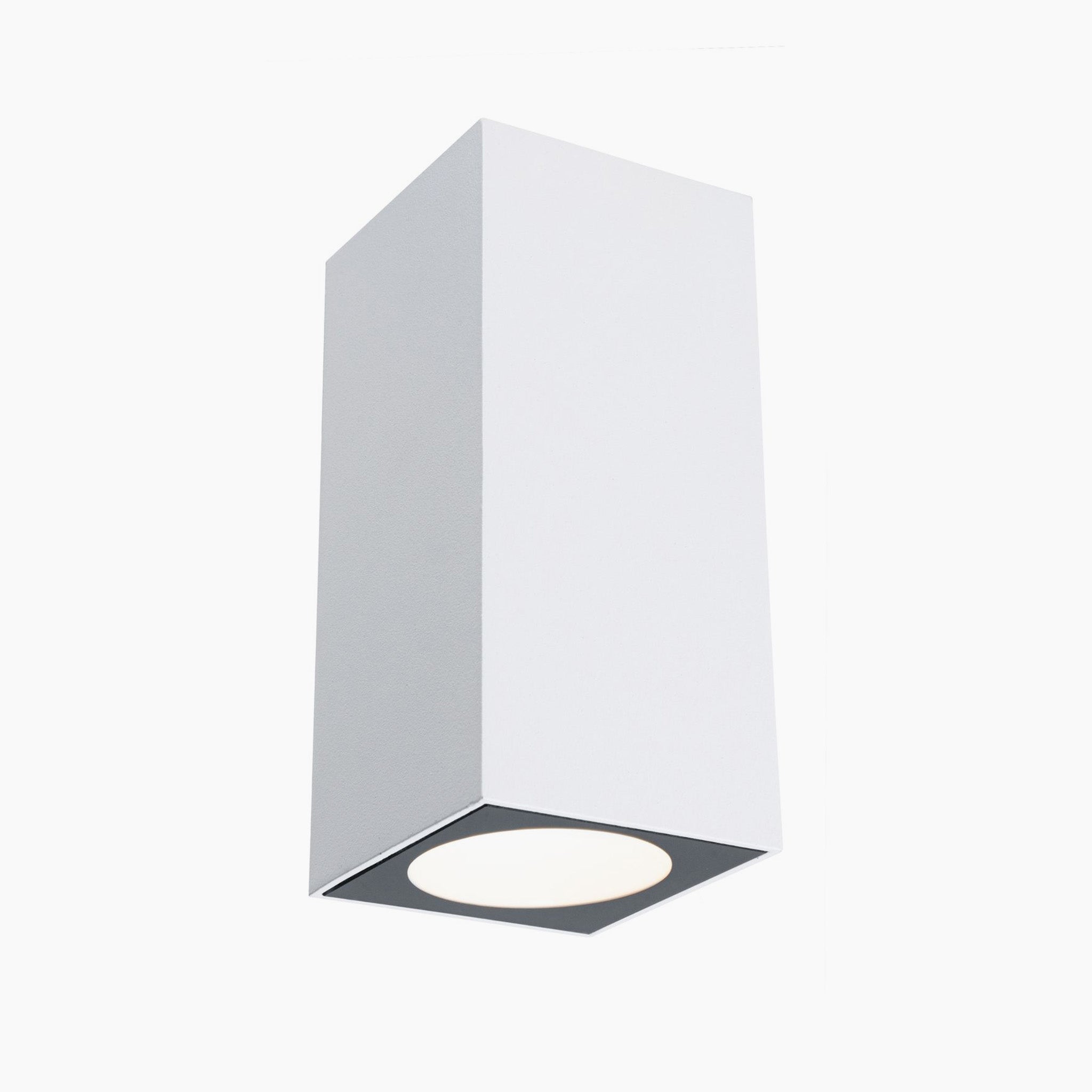 The Outdoor Flame 6.6W LED Dual Output Wall Light in White is a modern, rectangular wall luminaire that provides down-facing light and utilizes efficient LED technology to create attractive lighting effects.