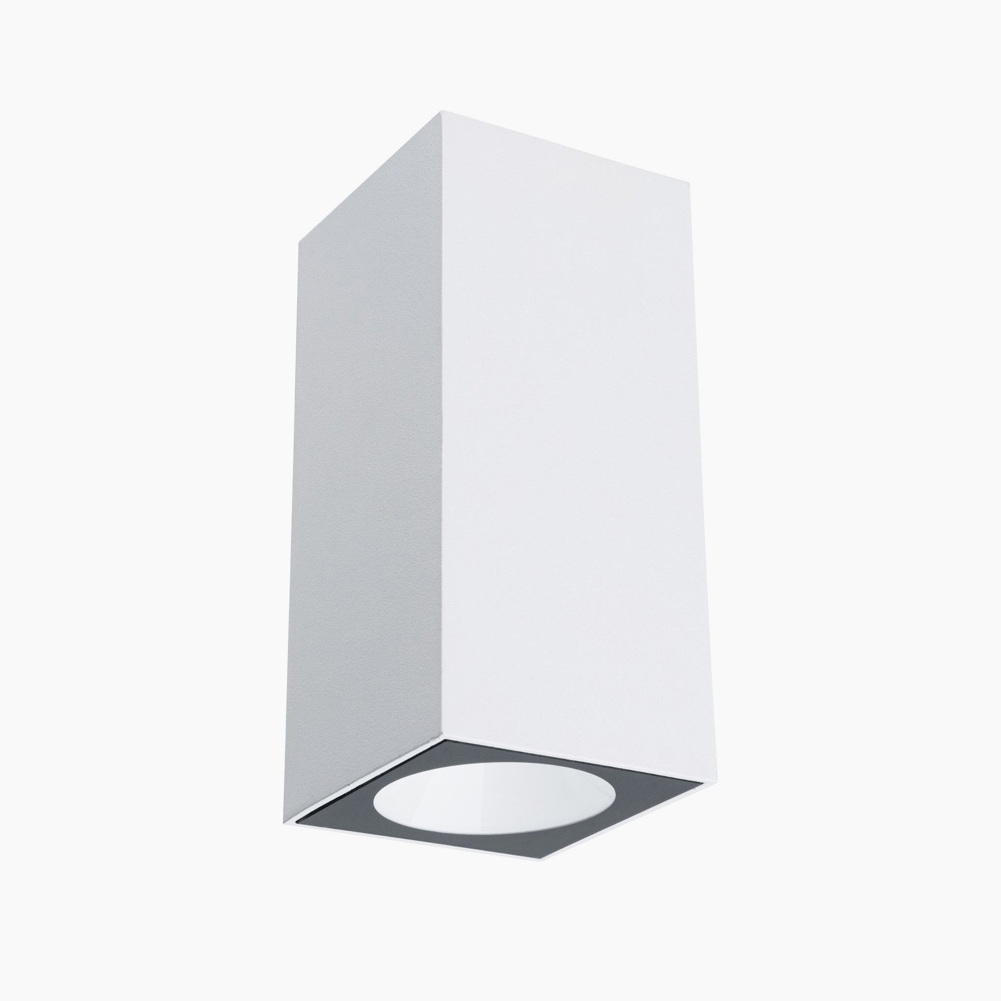 The Outdoor Flame 6.6W LED Dual Output Wall Light in White is a minimalist rectangular fixture that uses efficient LED technology for attractive lighting effects.