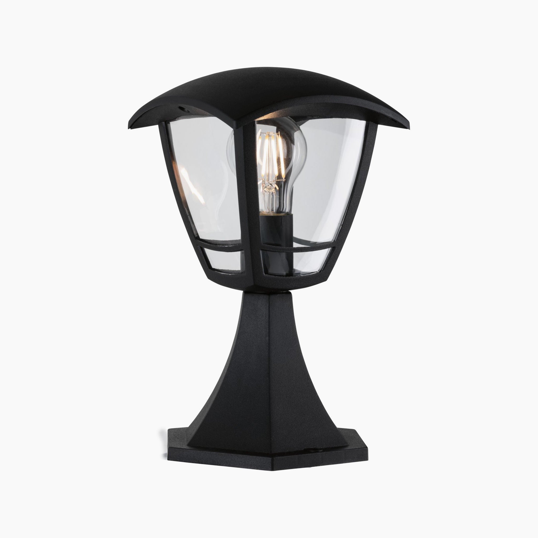 The Paulmann Outdoor Classic Curved 12W LED Bollard Light in Black features a timeless design with clear glass panels, showcasing a single exposed light bulb that's perfect for enhancing your outdoor lighting ambiance.