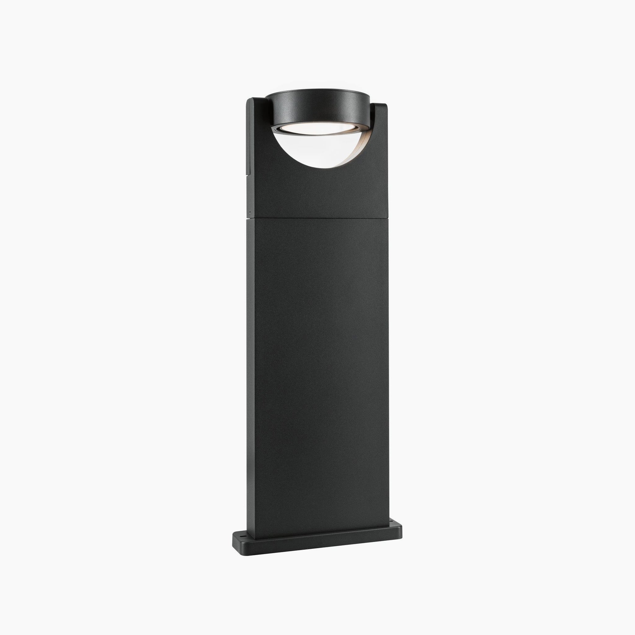 The Paulmann Outdoor Swivea 8W LED Bollard Light in Anthracite features a modern design with a rectangular base and circular top, ideal for enhancing your exterior lighting. This sleek light fixture offers both style and functionality to elevate your outdoor space.