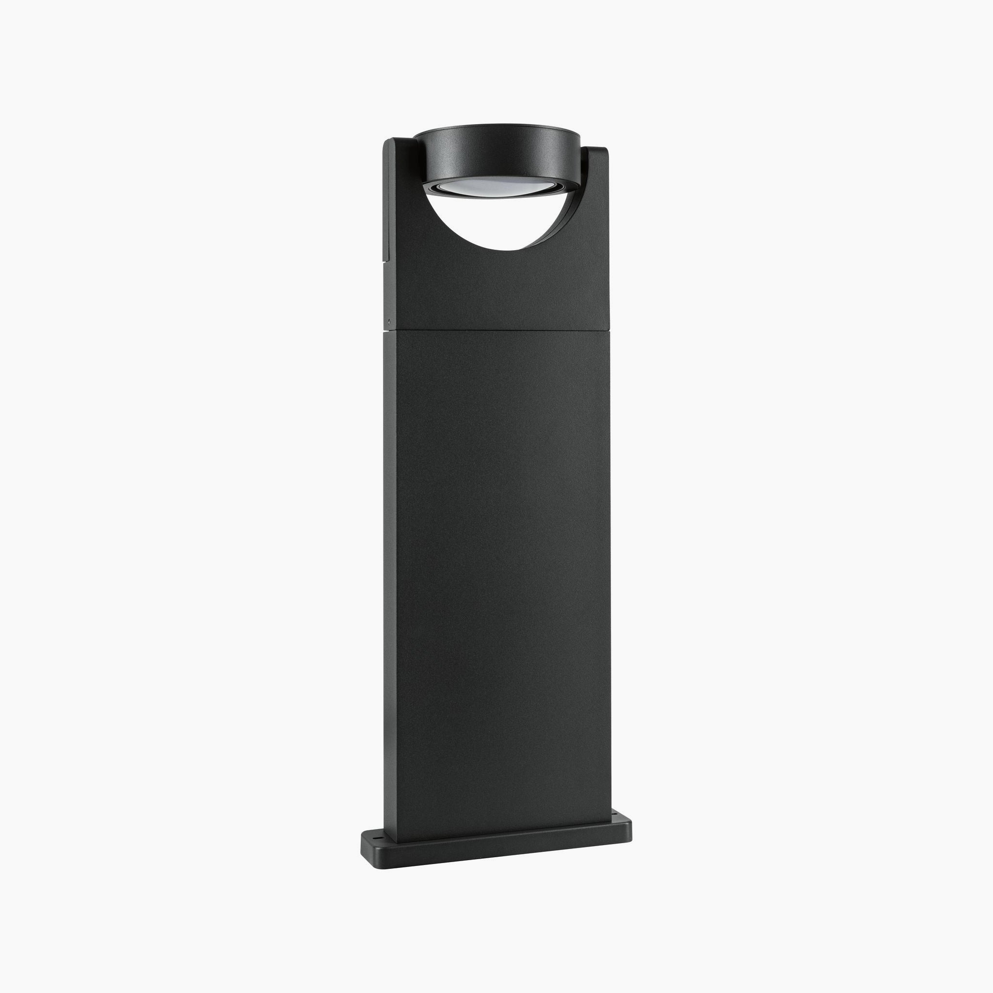 The Paulmann Outdoor Swivea 8W LED Bollard Light in Anthracite, with its sleek modern design featuring a rectangular base and circular top, enhances any exterior lighting setup.