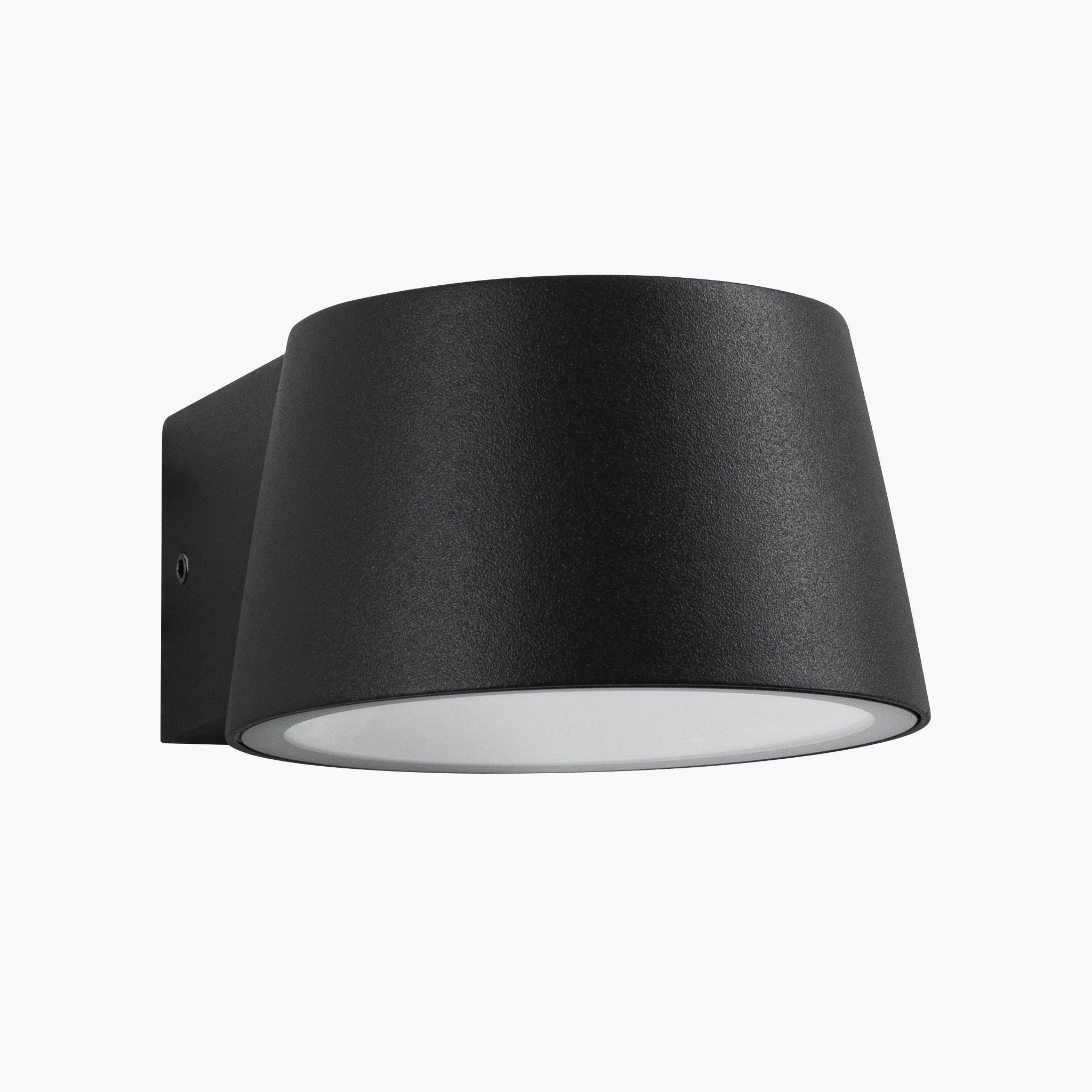 The Paulmann - Outdoor Capea 8W LED Wall Light in Anthracite features a sleek, wall-mounted design with a broad cylindrical shade, making it ideal for exterior walls. It is IP44 rated, ensuring durability and protection.