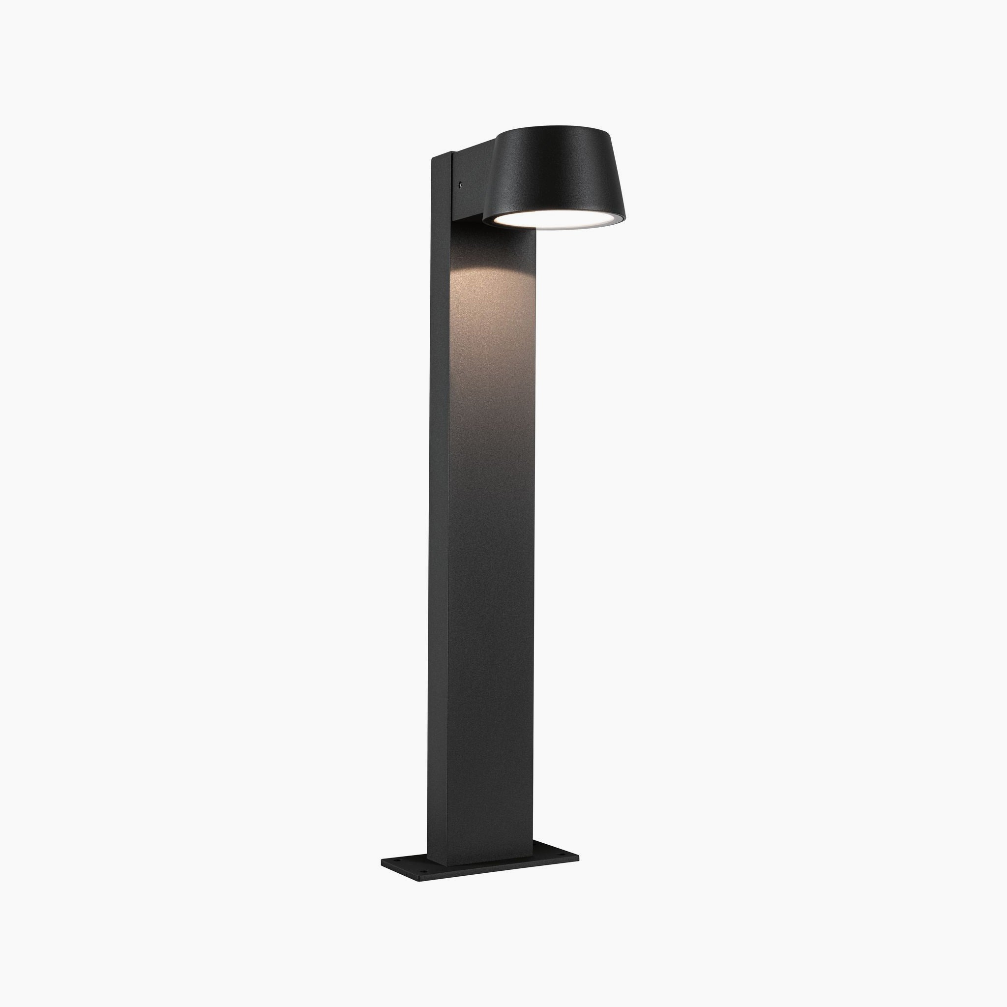 Paulmann's Outdoor Capea 8W LED Bollard Light in Anthracite features a chic modern design with a tall rectangular base and round top, optimized for safety and waterproof performance.