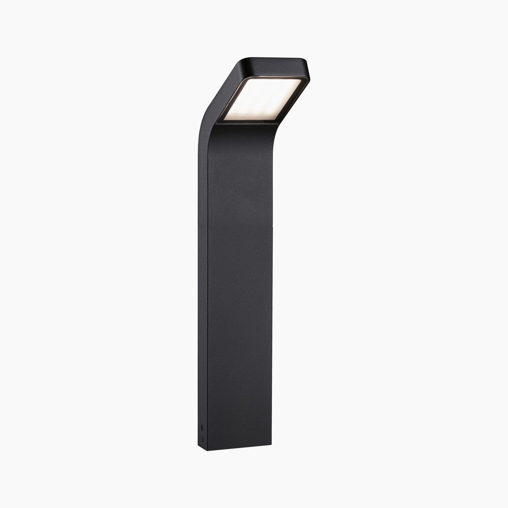 The Outdoor Kulma 9W LED Bollard Light in Anthracite is a contemporary black outdoor path light featuring a sleek rectangular design and an angled, illuminated top that provides glare-free illumination.