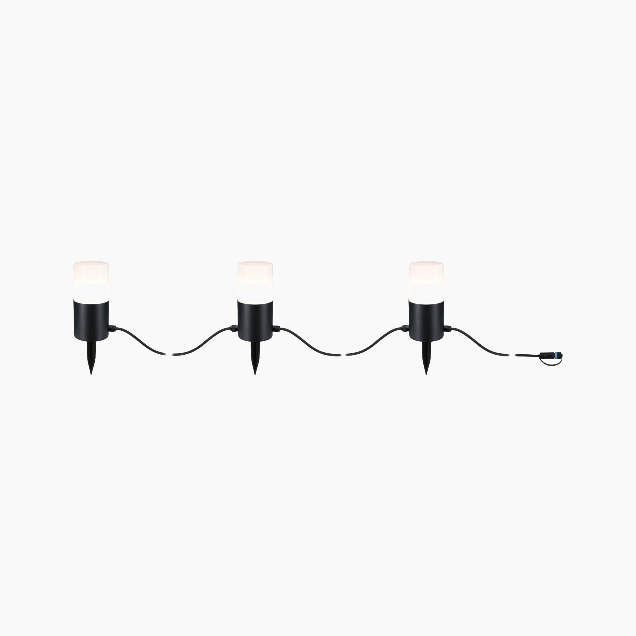 The Paulmann - Plug & Shine Outdoor 2W LED Fairy Lights in Anthracite feature three lights connected by a cable. These lights emit a warm white glow and are designed for easy ground installation, making them ideal for adding elegant style to your outdoor decorations.