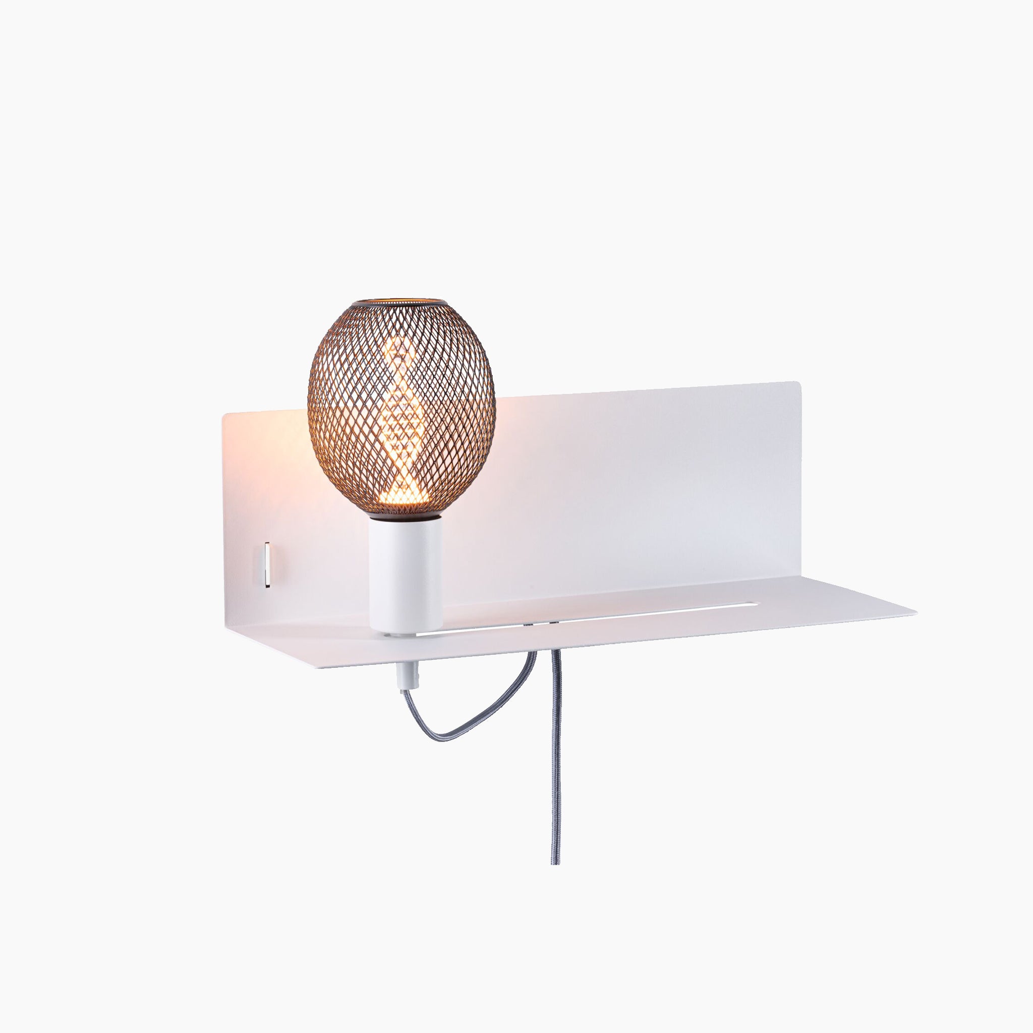 The Devara 40W Wall Mounted Lamp with USB Port in White Matt features a modern wall sconce design, complete with a black mesh globe lampshade mounted on a white, flat, rectangular fixture base that includes an integrated shelf and a USB-C charging port.