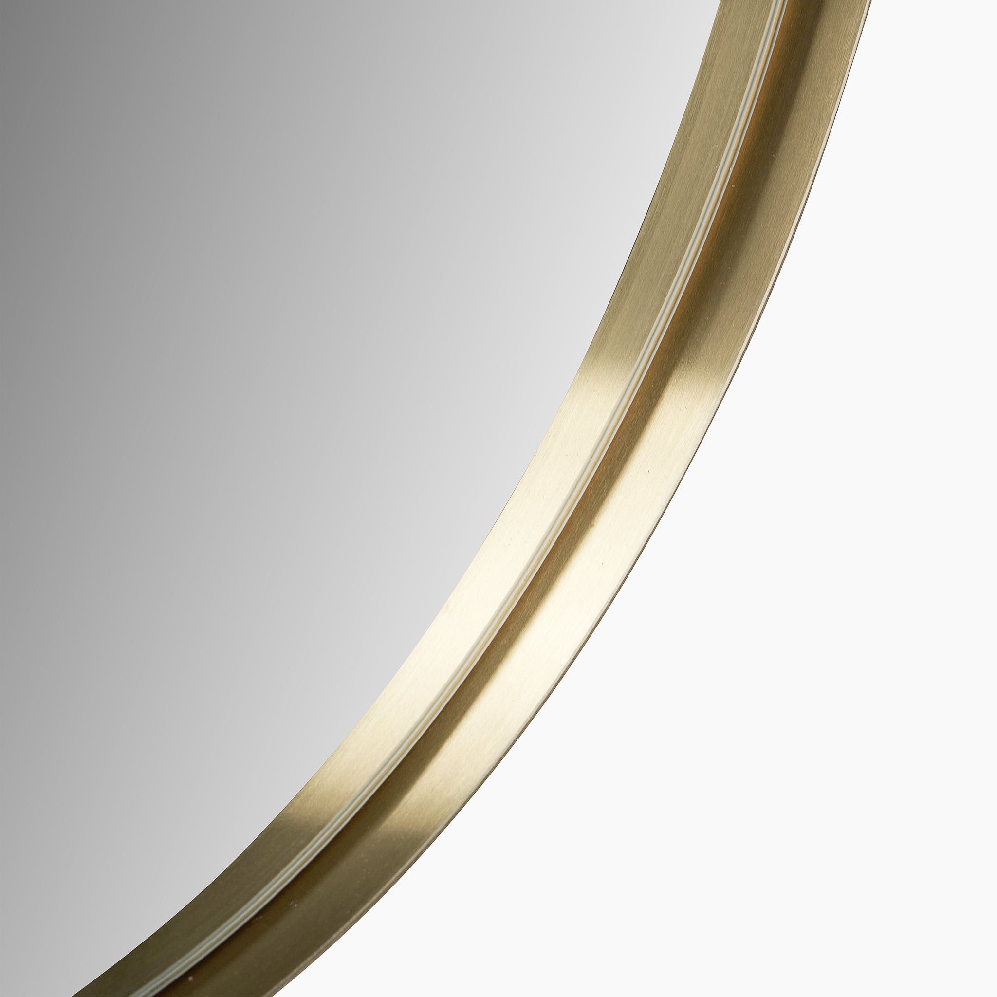 Close-up of the Brushed Gold Metal Slim Frame Round Wall Mirror Large against a white background, showcasing its contemporary and minimalist design.