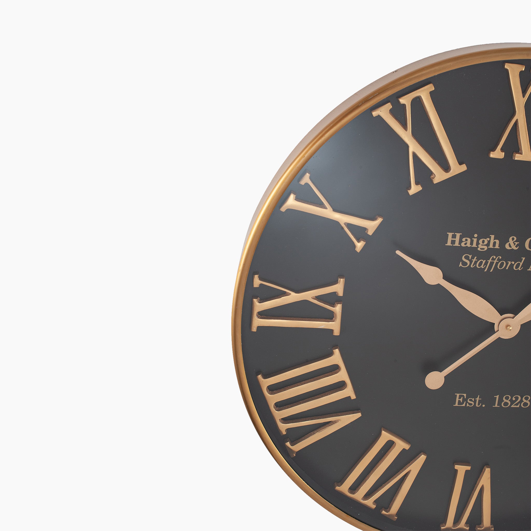 A close-up of the Antique Gold and Black Metal Wall Clock, featuring oversized Roman numerals on a dark face, perfectly suited for contemporary interiors, shows the time as 10:08.