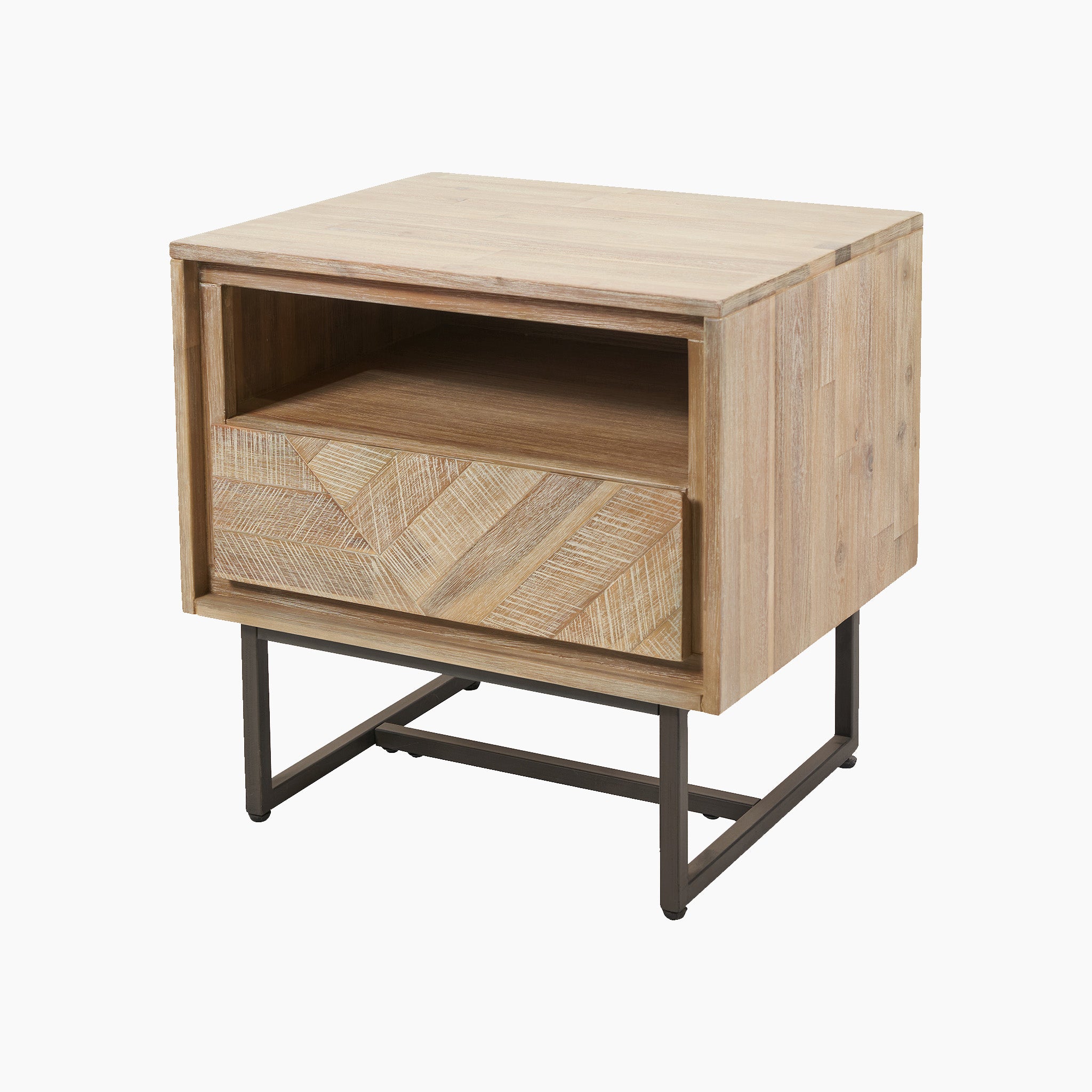 The Marca Sand Wash Acacia Wood and Black Metal Bedside Unit embodies a Scandi style with its wooden design, featuring an open shelf and a drawer, all supported by sleek black metal legs, providing ample storage space.