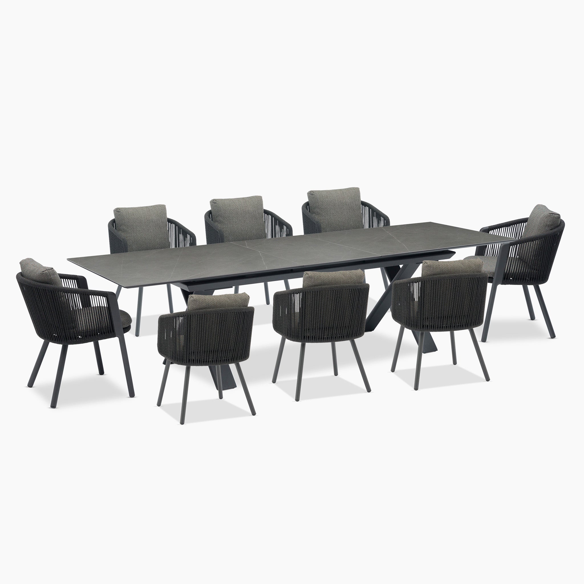 The Dekota 8 Seat Rope Extending Dining Set in Charcoal offers a modern dining table with sleek, dark-toned ergonomically shaped chairs.