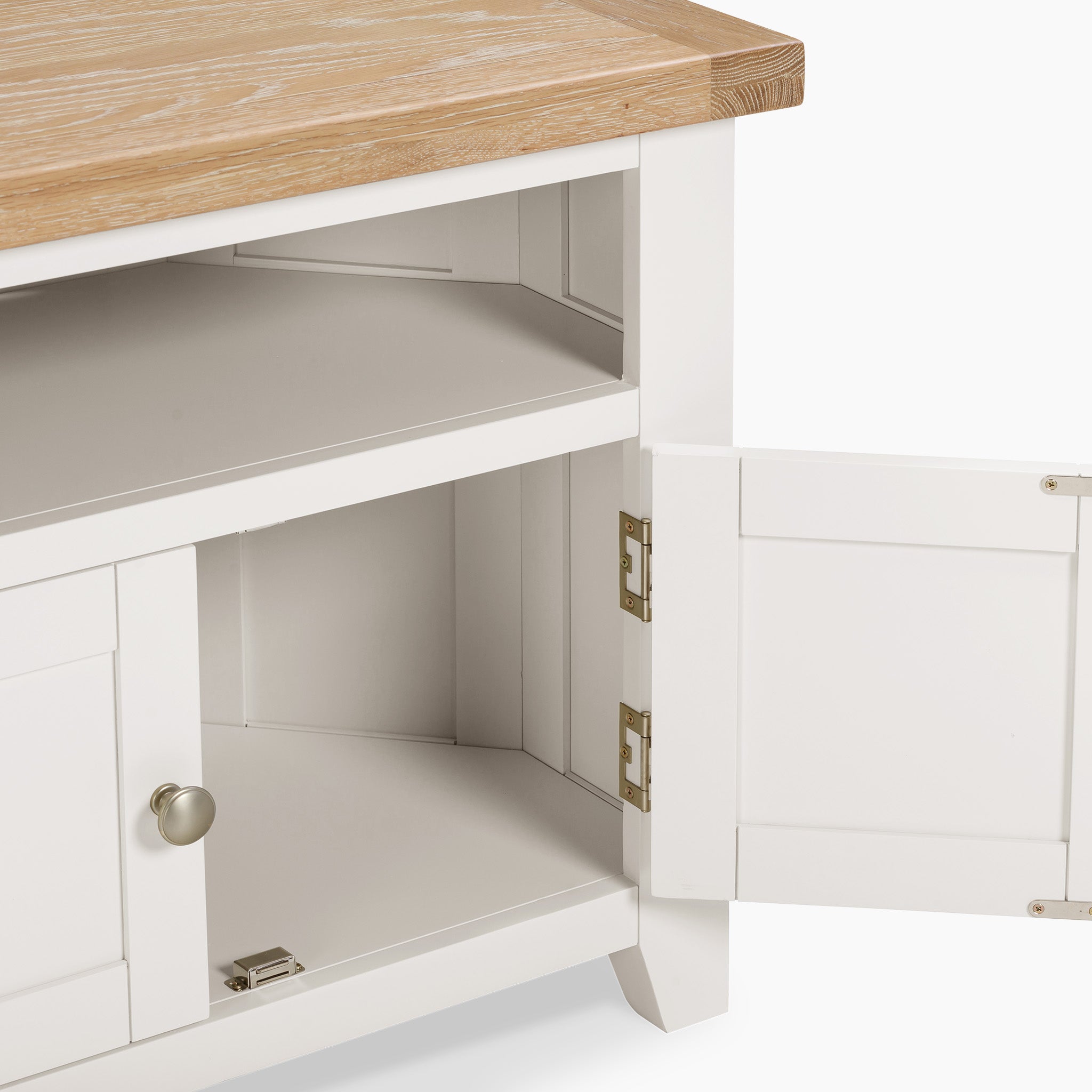 Warm White Burford Corner Media Unit with an open door, featuring an open shelf, a light wood top, and seamless cable management.