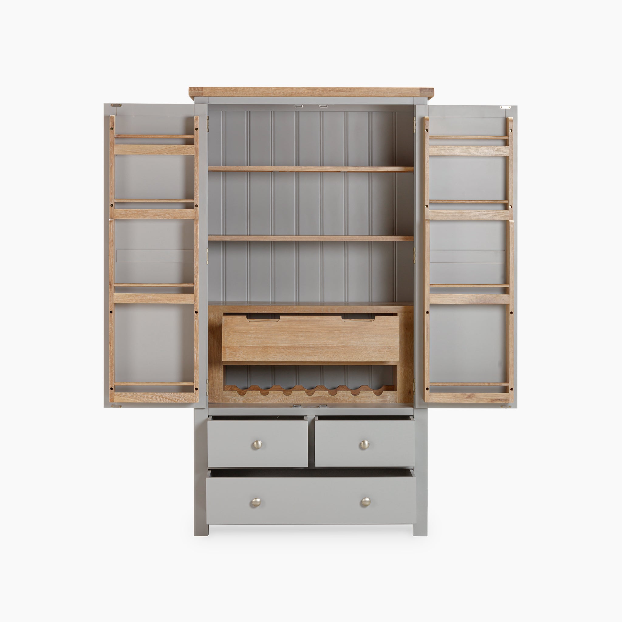 The Burford Double Larder Unit in Pebble Grey provides exceptional storage and organization with its open grey wooden cabinet, which includes two doors, shelves, drawers, and a wine rack. Made from high-quality natural oak, it adds a stylish touch to any home.