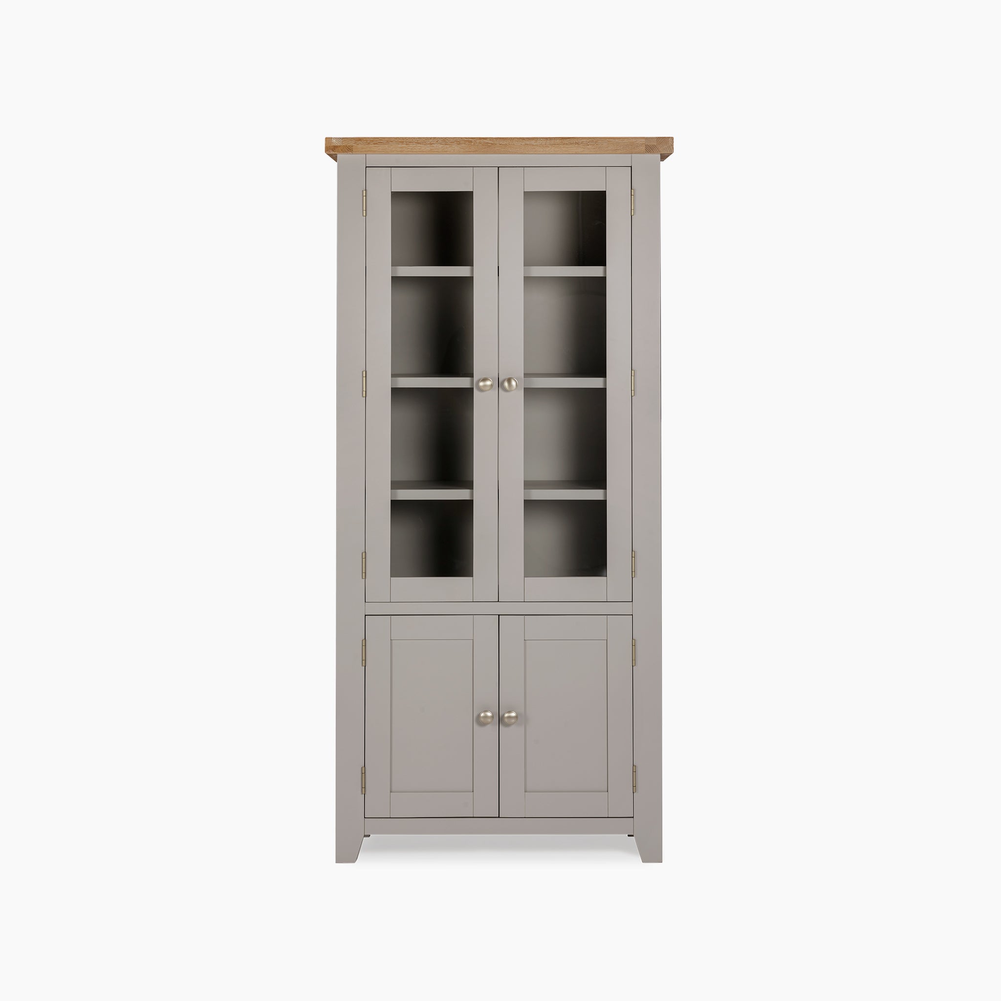 Introducing the Burford Display Cabinet in Pebble Grey, featuring elegant glass-paneled doors on top and a natural oak surface. Its tall gray design offers closed storage at the bottom, seamlessly blending style and functionality for your living space.