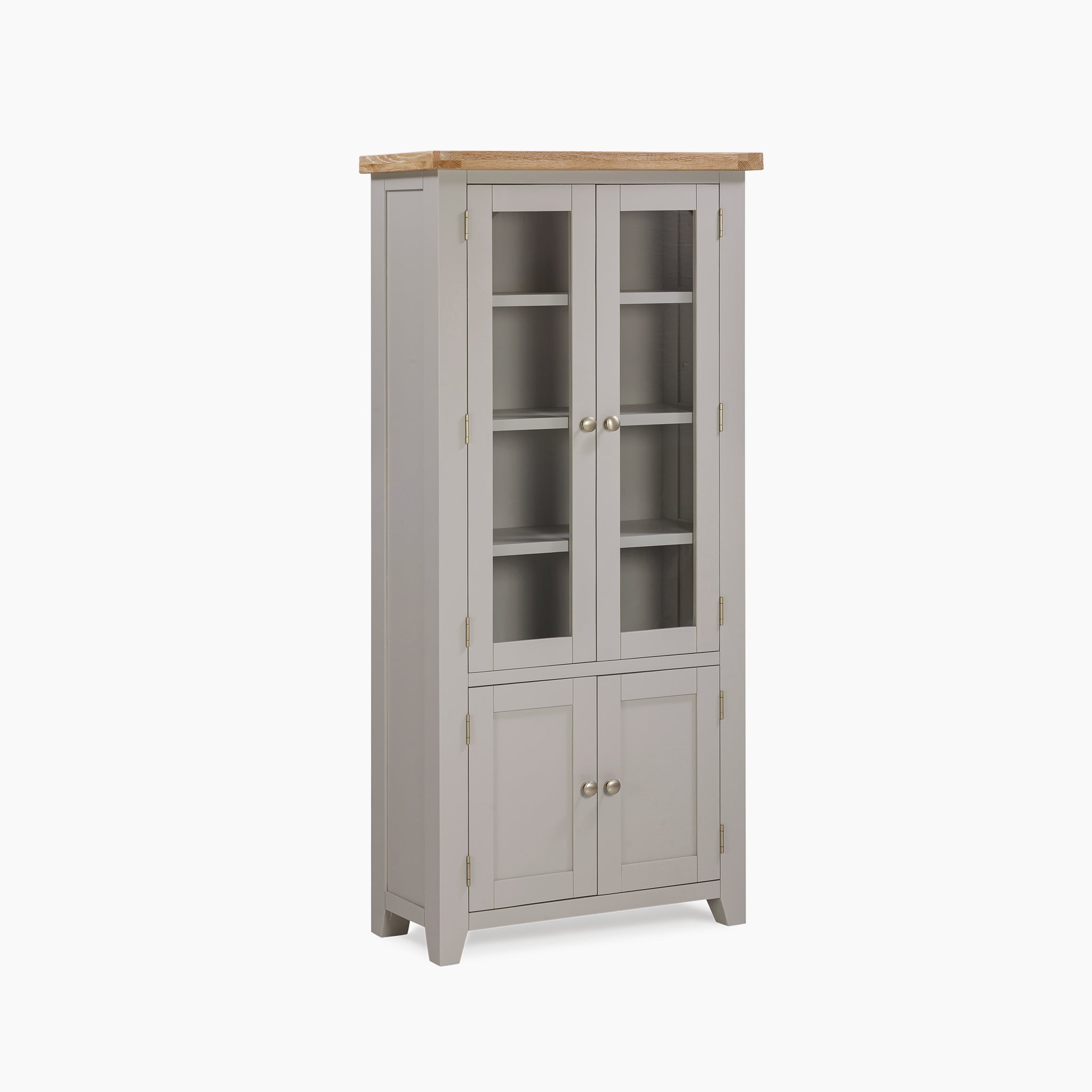 The Burford Display Cabinet in Pebble Grey features a natural oak top and gray wooden construction. Its stylish glass-paneled doors open to reveal spacious closed storage, all set against a clean white backdrop.