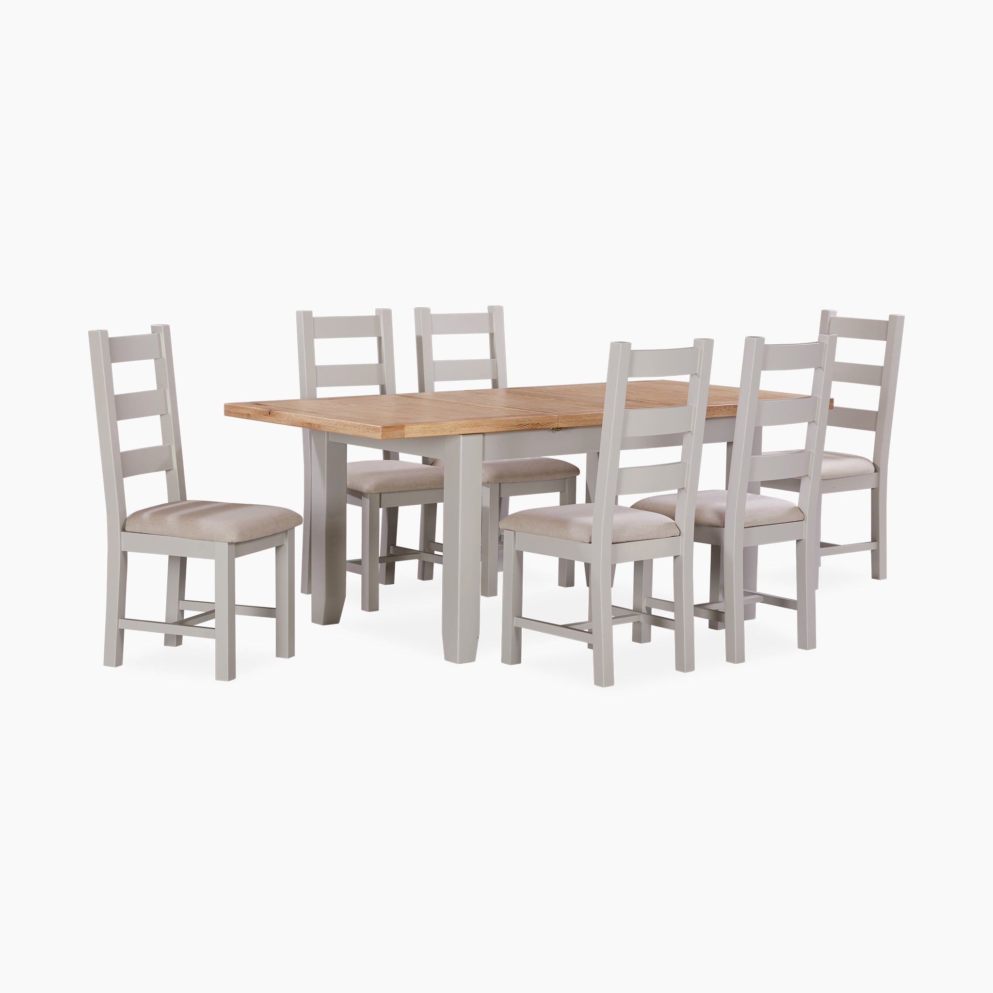 The Burford 4-6 Seater Extending Dining Table in Pebble Grey showcases a light brown top made from natural oak, perfectly paired with six gray chairs featuring cushioned seats, combining style and comfort for your dining space.