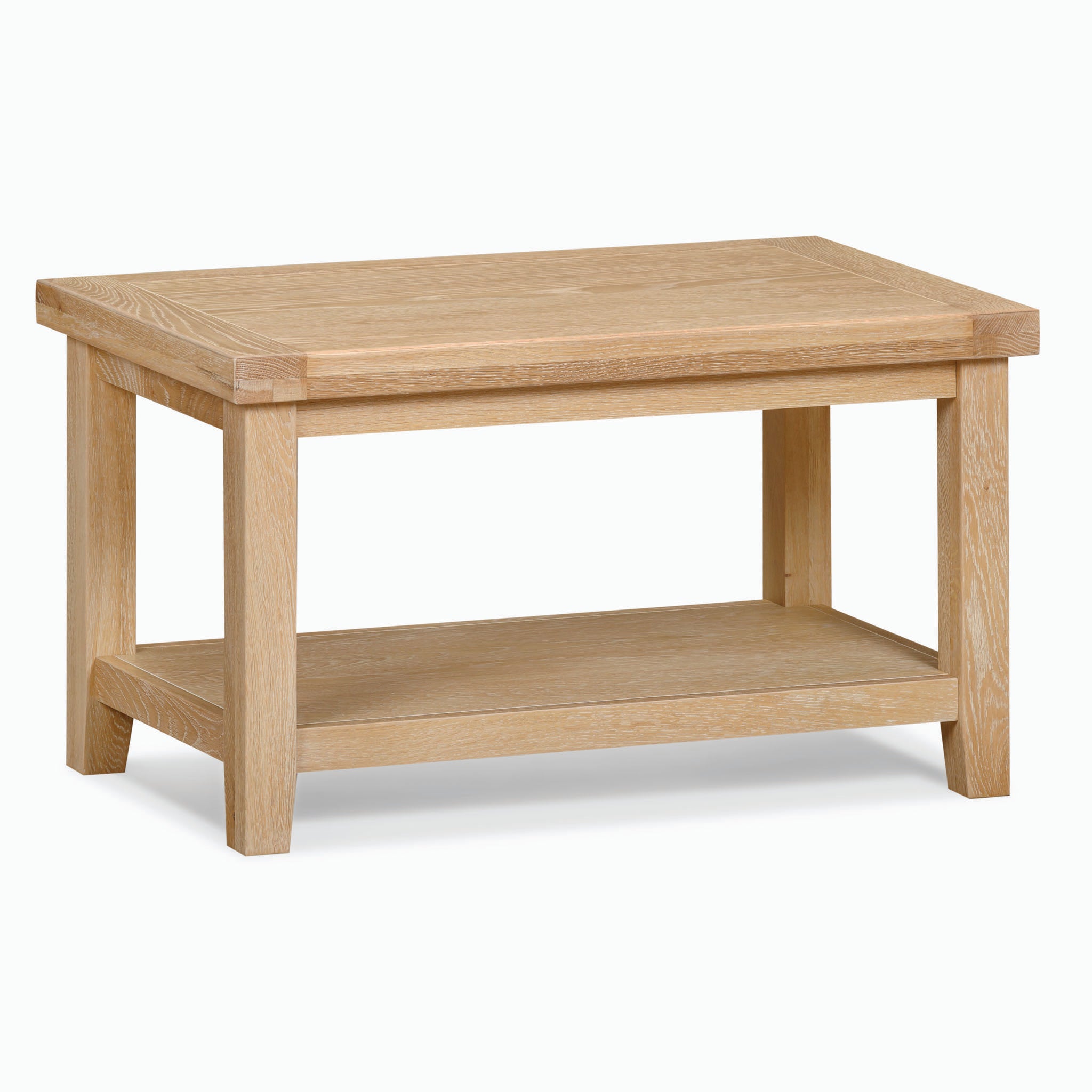 The Burford Large Coffee Table with Shelf in Natural Oak is a rectangular, solid oak coffee table featuring a lower shelf and a stunning natural oak finish.