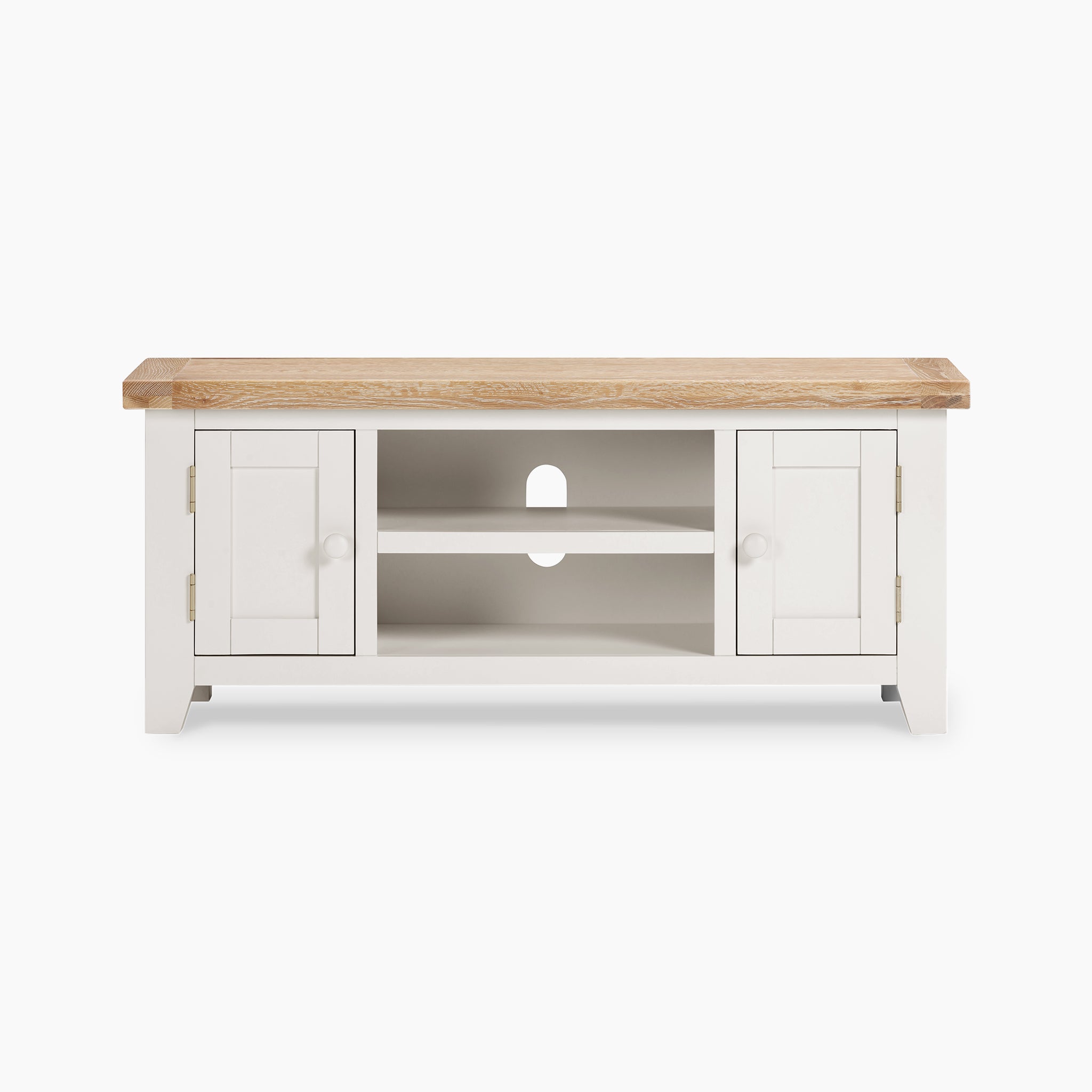 The Burford 120cm Media Unit in Warm White exudes rustic charm with its white TV stand and white-washed oak top. It features two cabinets and two open shelves, all equipped with a convenient cable management hole.