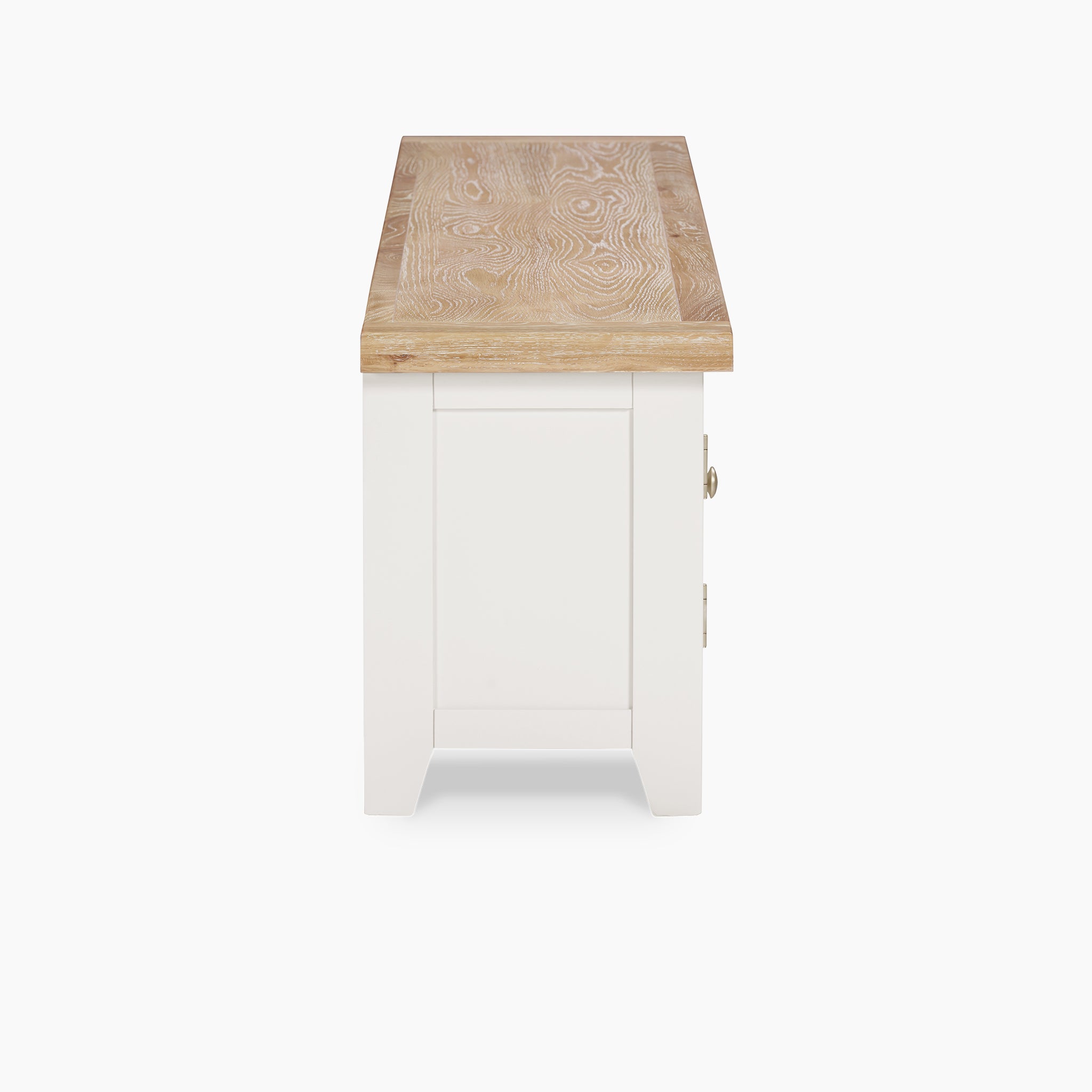 Side view of the Burford Large 180cm Media Unit in Warm White, featuring a light wood top crafted from natural oak, on a plain white background.