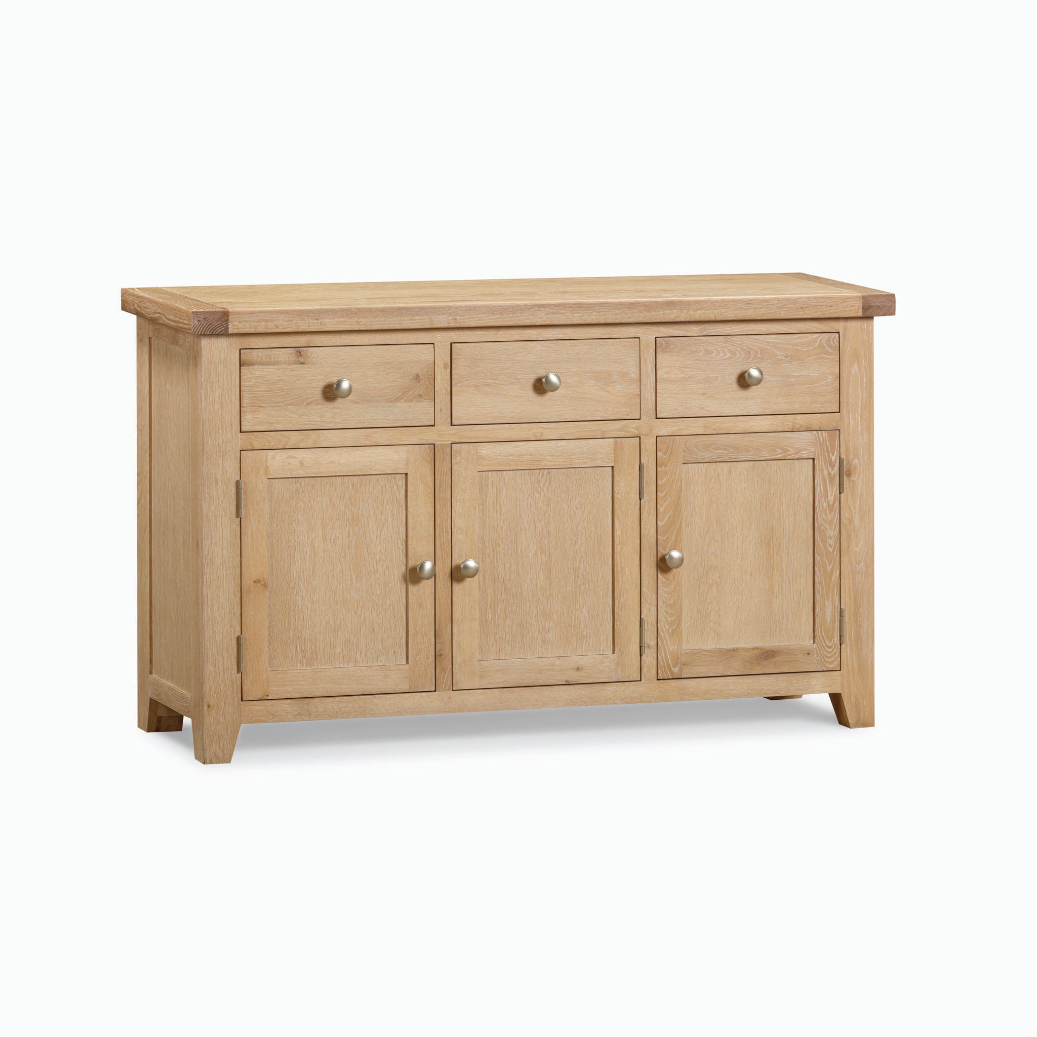 The Burford Large 3 Door 3 Drawers Sideboard in Natural Oak features three drawers above three cabinets, each adorned with metallic handles, all set against a white background. This elegant piece provides ample storage while maintaining a sophisticated aesthetic.