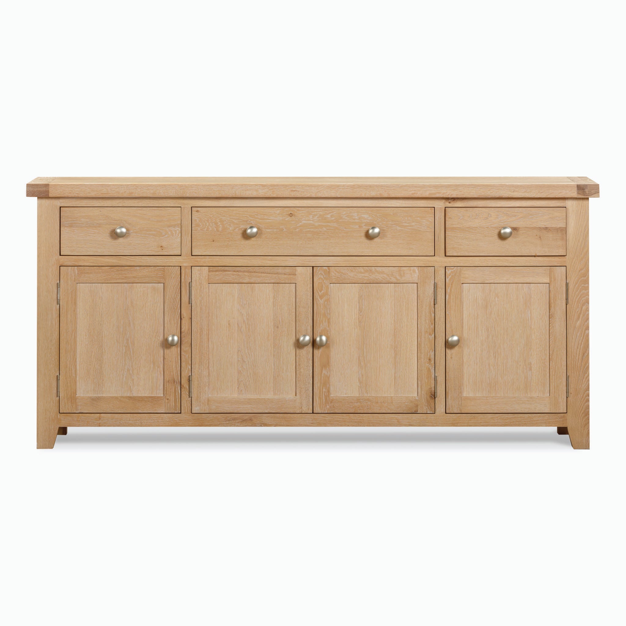 The Burford Large 4 Door 3 Drawers Sideboard in Natural Oak, featuring three top drawers and four bottom cabinets, all adorned with round metal knobs. This elegant piece of storage furniture combines functionality with timeless style.