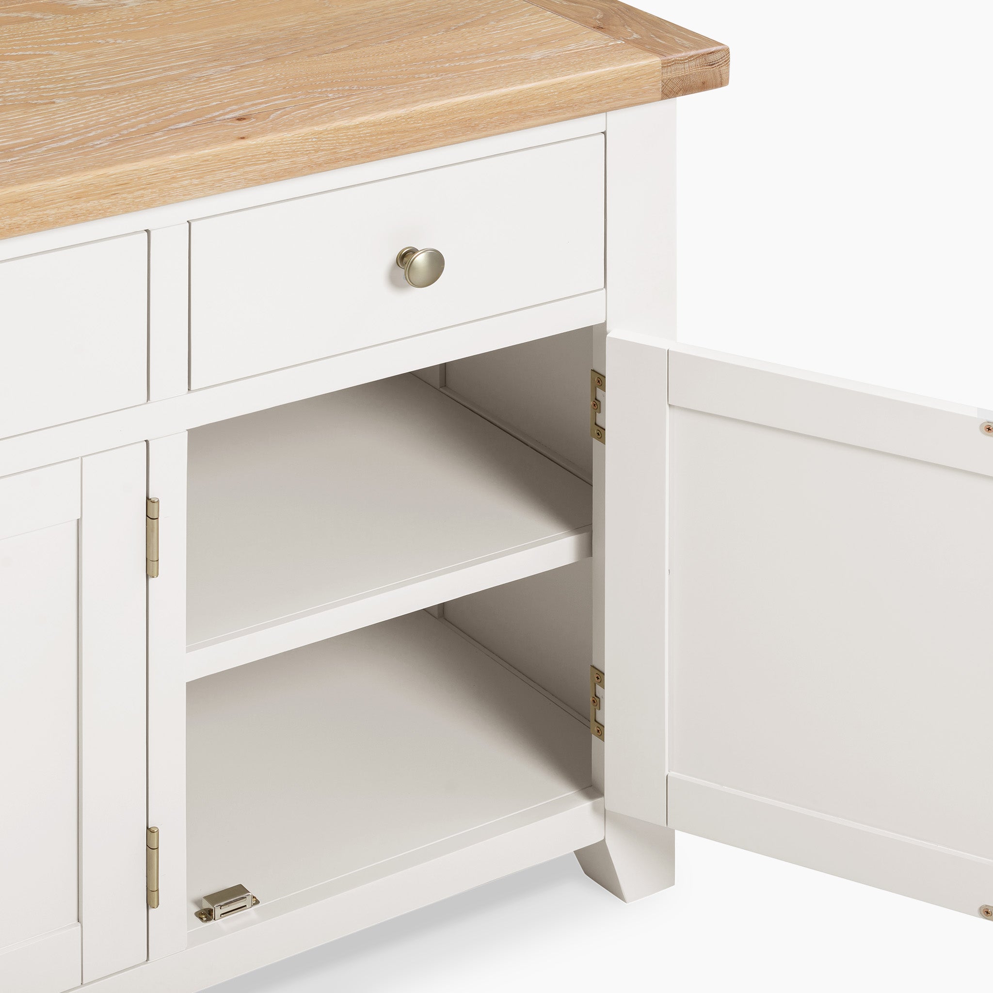 Burford Large 4 Door 3 Drawers Sideboard in Warm White with a natural oak top features a single drawer and an open door revealing interior storage shelves.