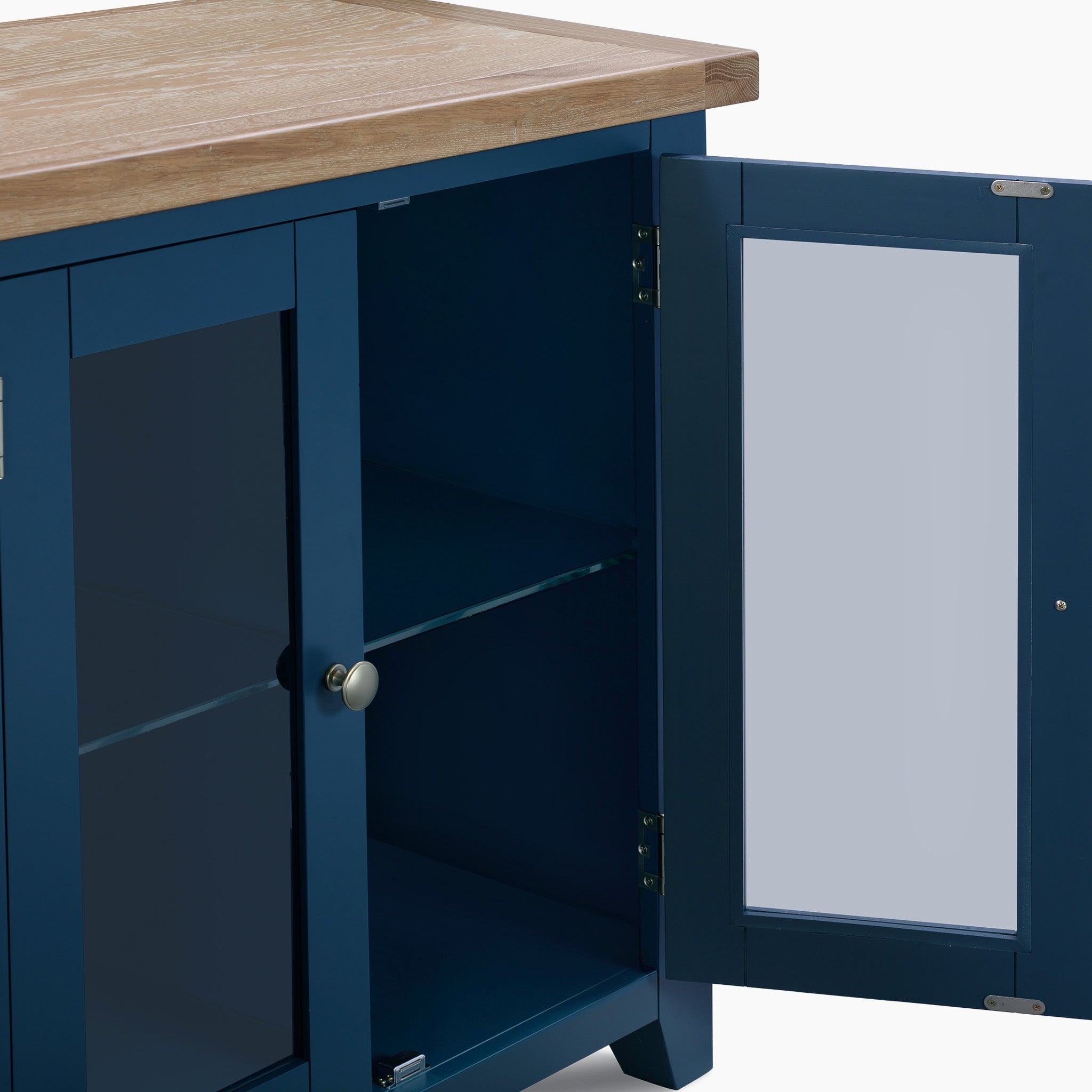 The Burford Grand Sideboard with Wine Rack in Navy Blue features a glass-panel door that opens to reveal an empty shelf, bringing a sleek and modern aesthetic to any room.