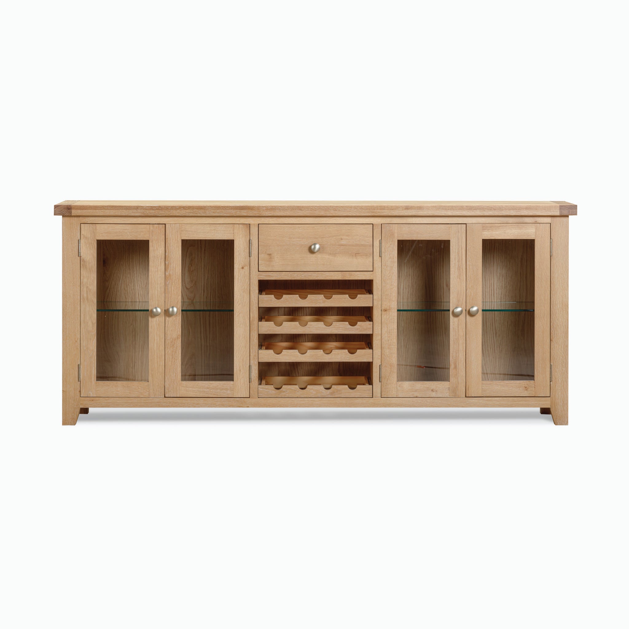 The Burford Grand Sideboard with Wine Rack in Natural Oak exudes rustic sophistication with its natural oak construction, glass-paneled doors, central drawer, and light natural finish.