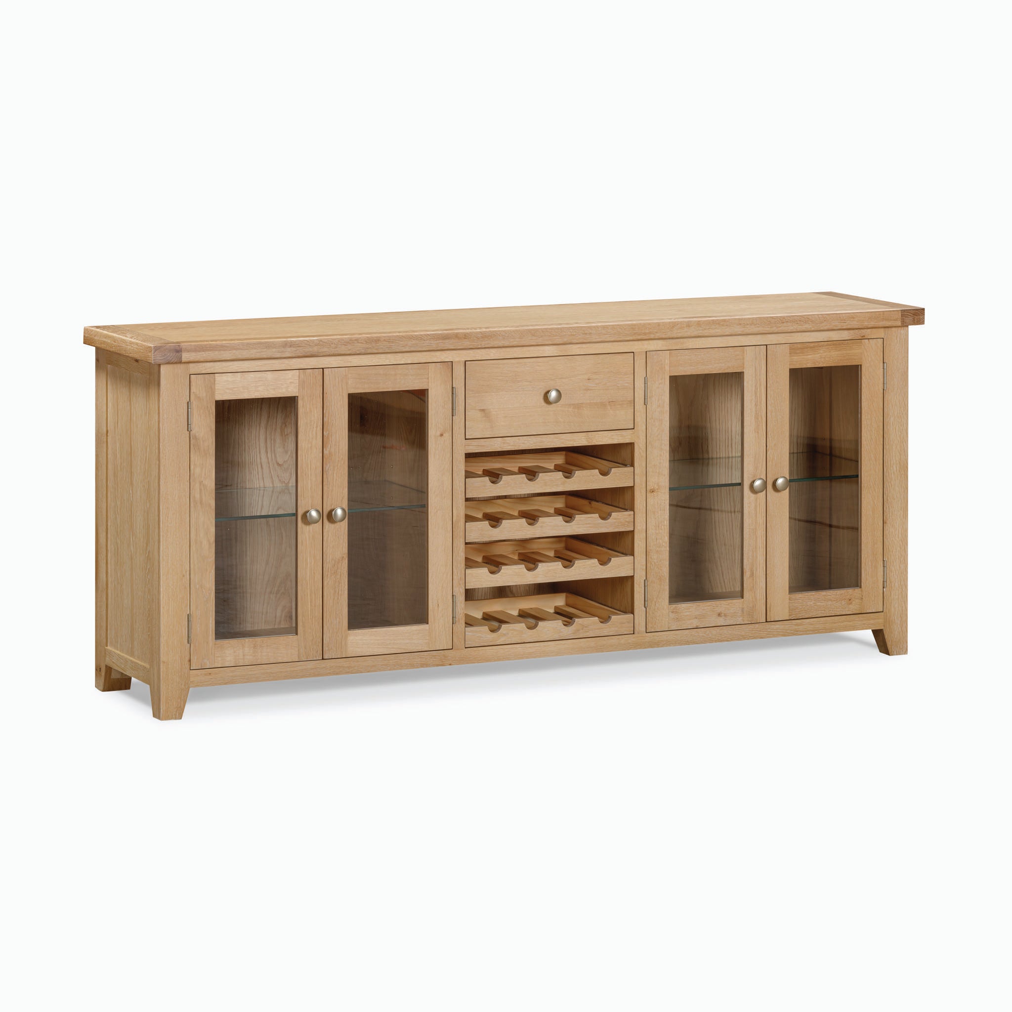 The Burford Grand Sideboard with Wine Rack in Natural Oak exemplifies rustic sophistication, featuring glass-paneled doors, a central drawer, and wine racks in the middle section.