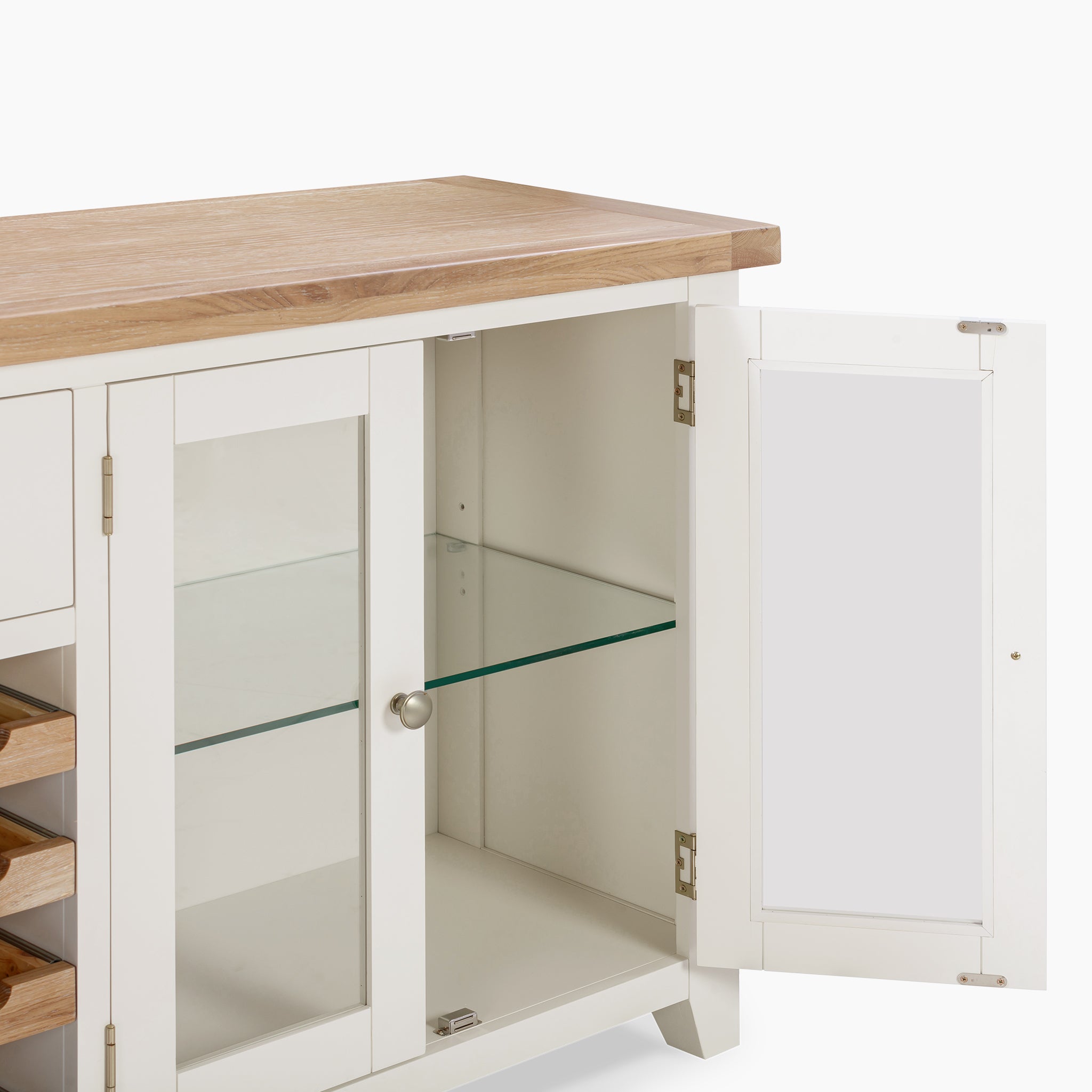 The Burford Grand Sideboard with Wine Rack in Warm White features a natural oak wooden top and glass-paneled doors, revealing spacious shelves inside.