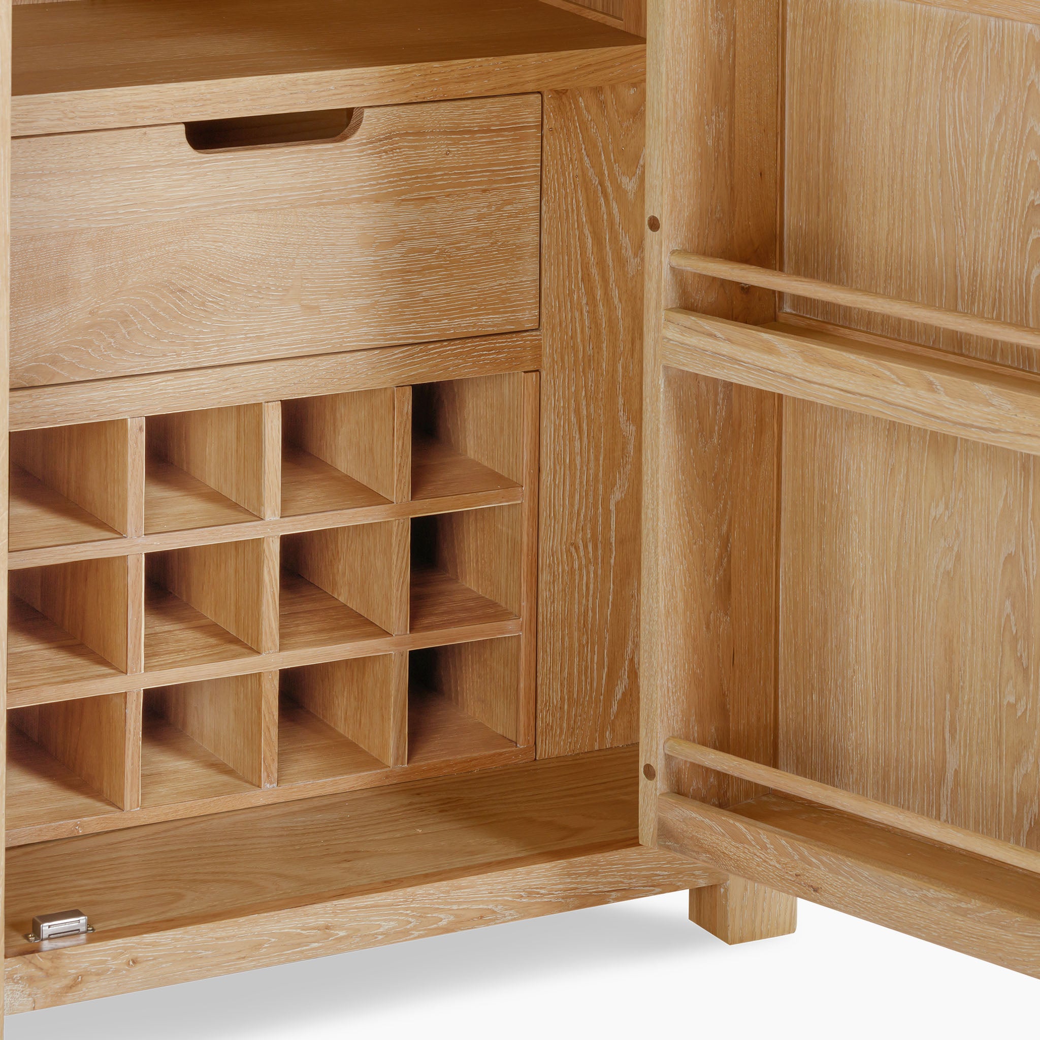 The Burford Single Larder Unit in Natural Oak is an ideal storage solution, featuring an open door design, a drawer, multiple square compartments, and handy side shelves.