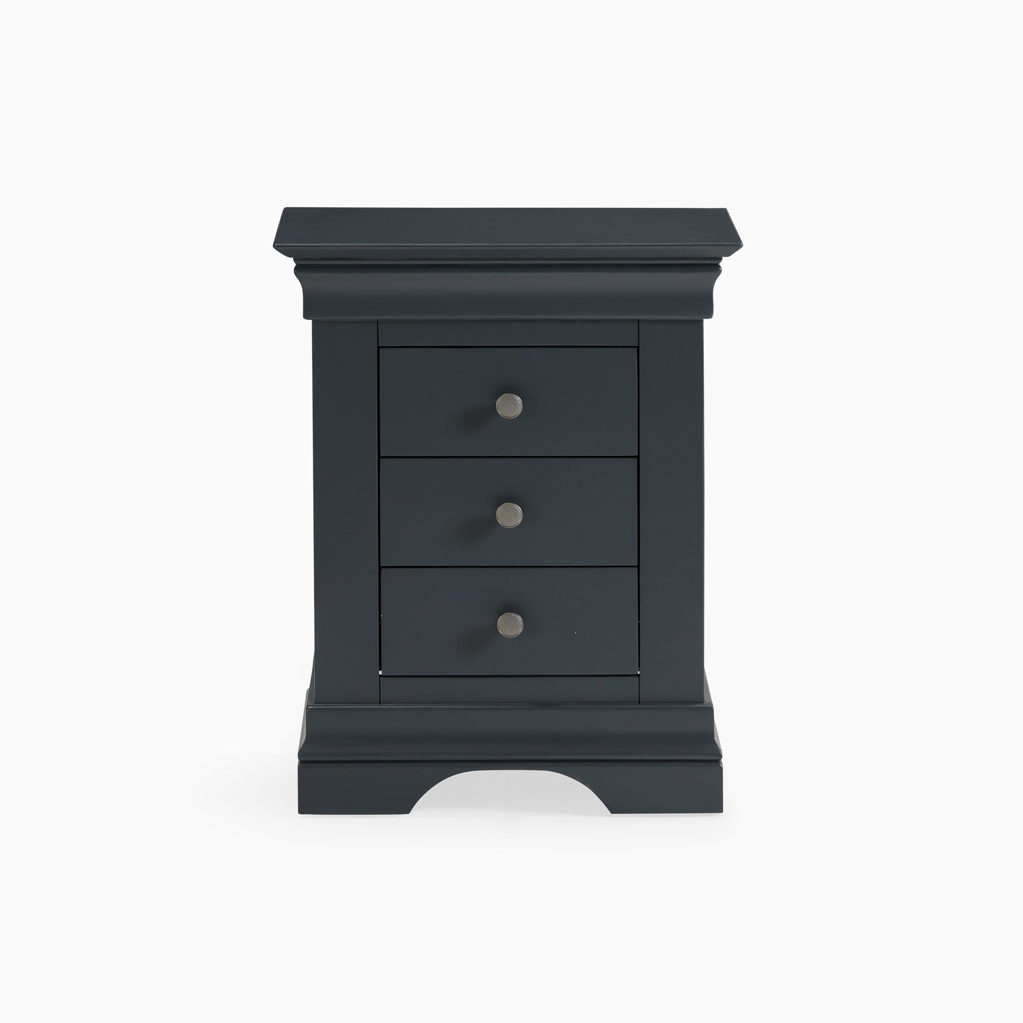 The Chalbury 3 Drawer Bedside Table in Dusky Black, made from solid oak and equipped with round knobs, combines elegance and functionality, standing out beautifully against a white background.