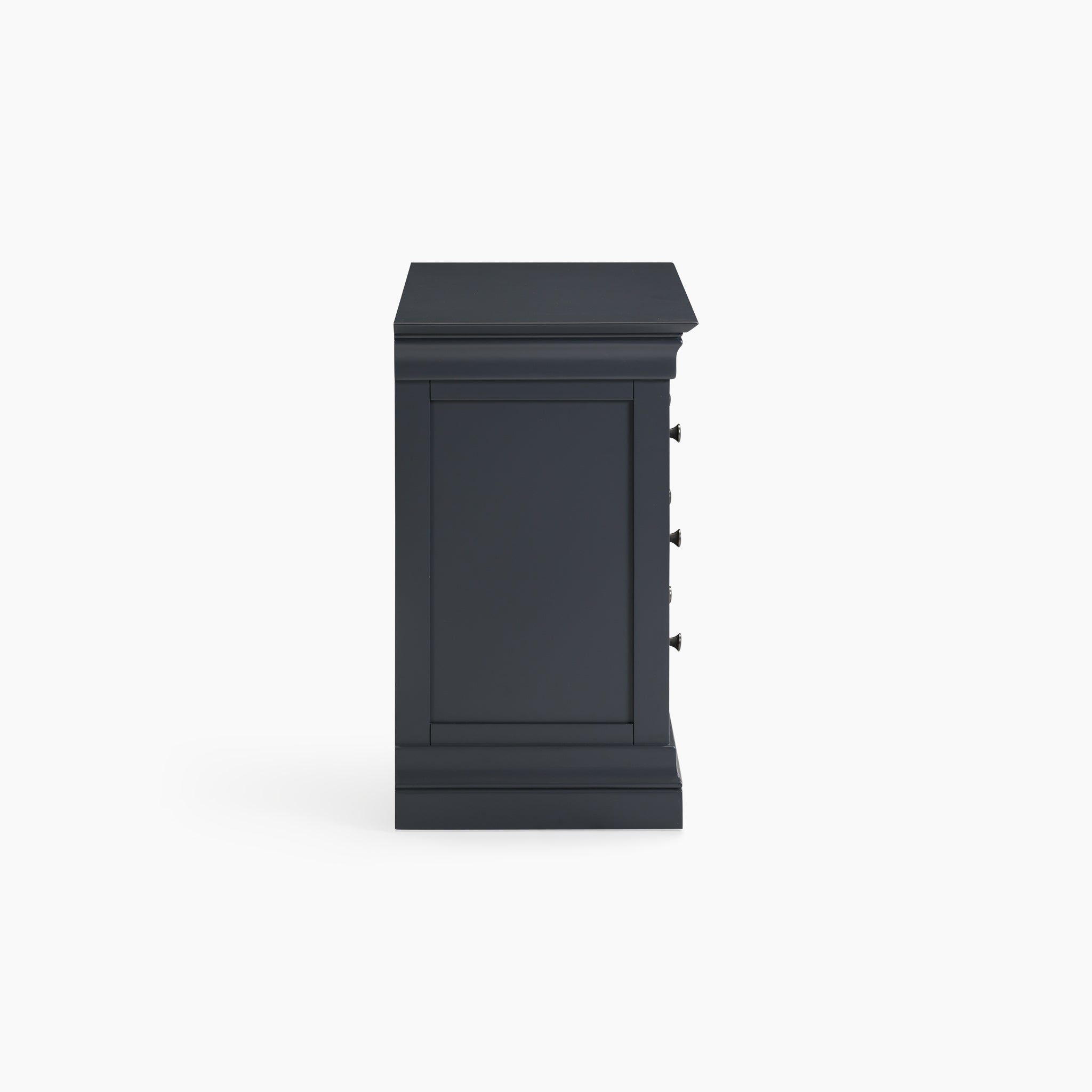 Side view of the Chalbury 3 Drawer Chest in Dusky Black, a sleek black wooden cabinet with no visible handles, set against a pristine white background and embodying modern design.