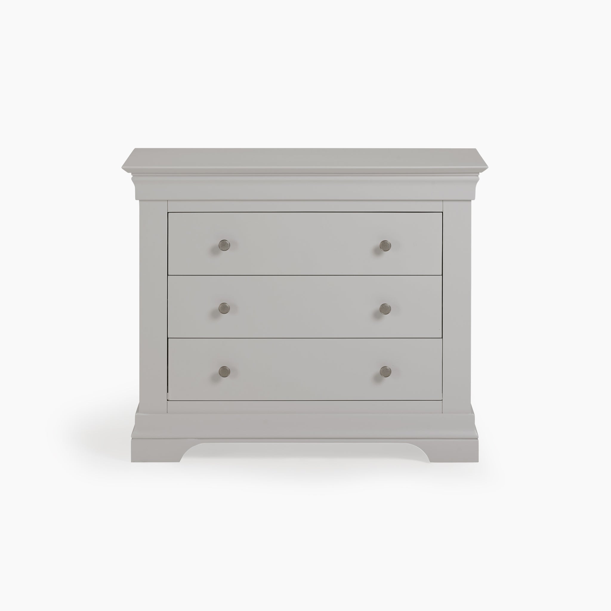 The Chalbury 3 Drawer Chest in Pebble Grey is a chic storage unit, showcasing a gray wooden finish with three drawers and small round handles.