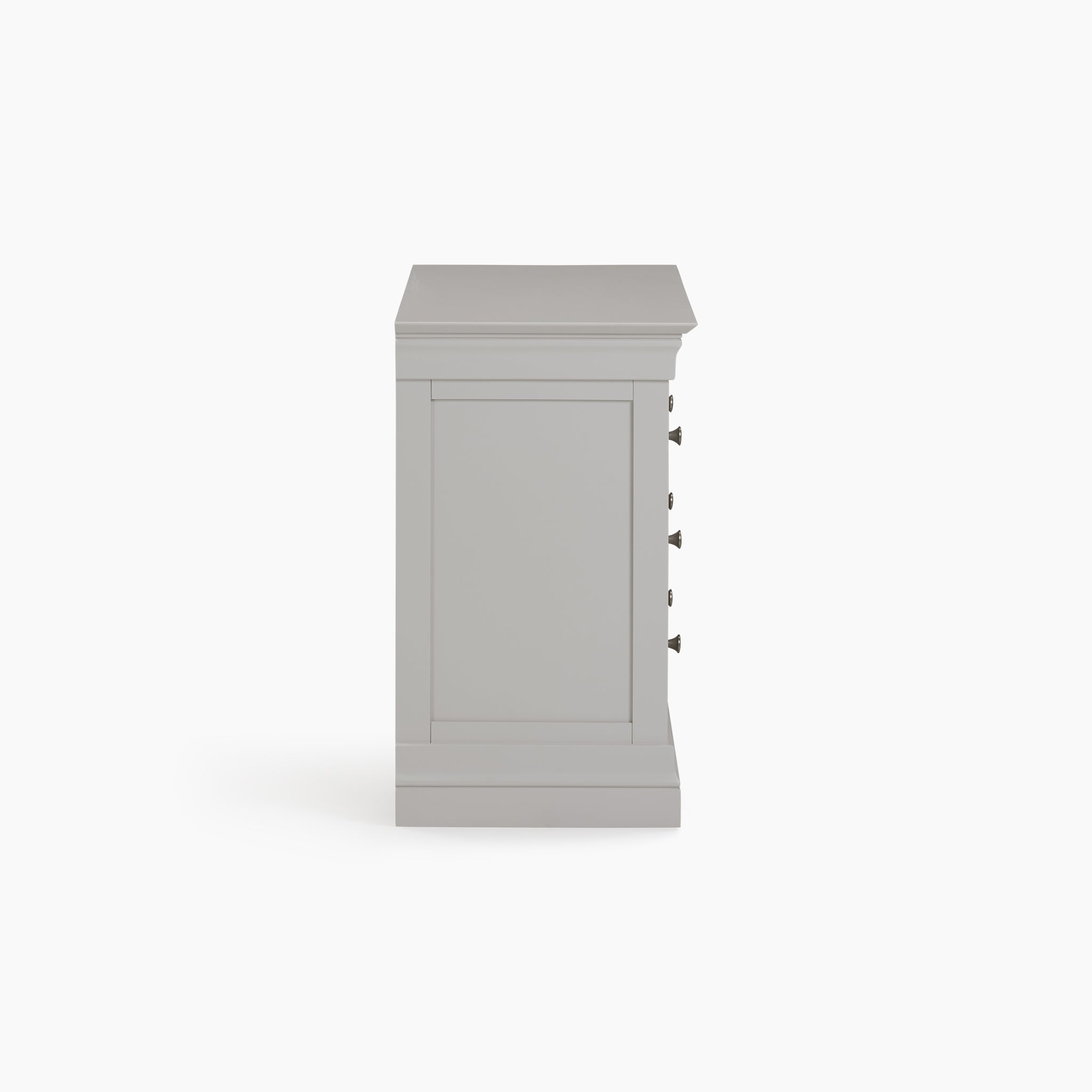 Side perspective of the Chalbury 3 Drawer Chest in Pebble Grey, featuring a gray wooden cabinet with three drawers and elegant black handles set against a white backdrop—perfect storage furniture for any room.