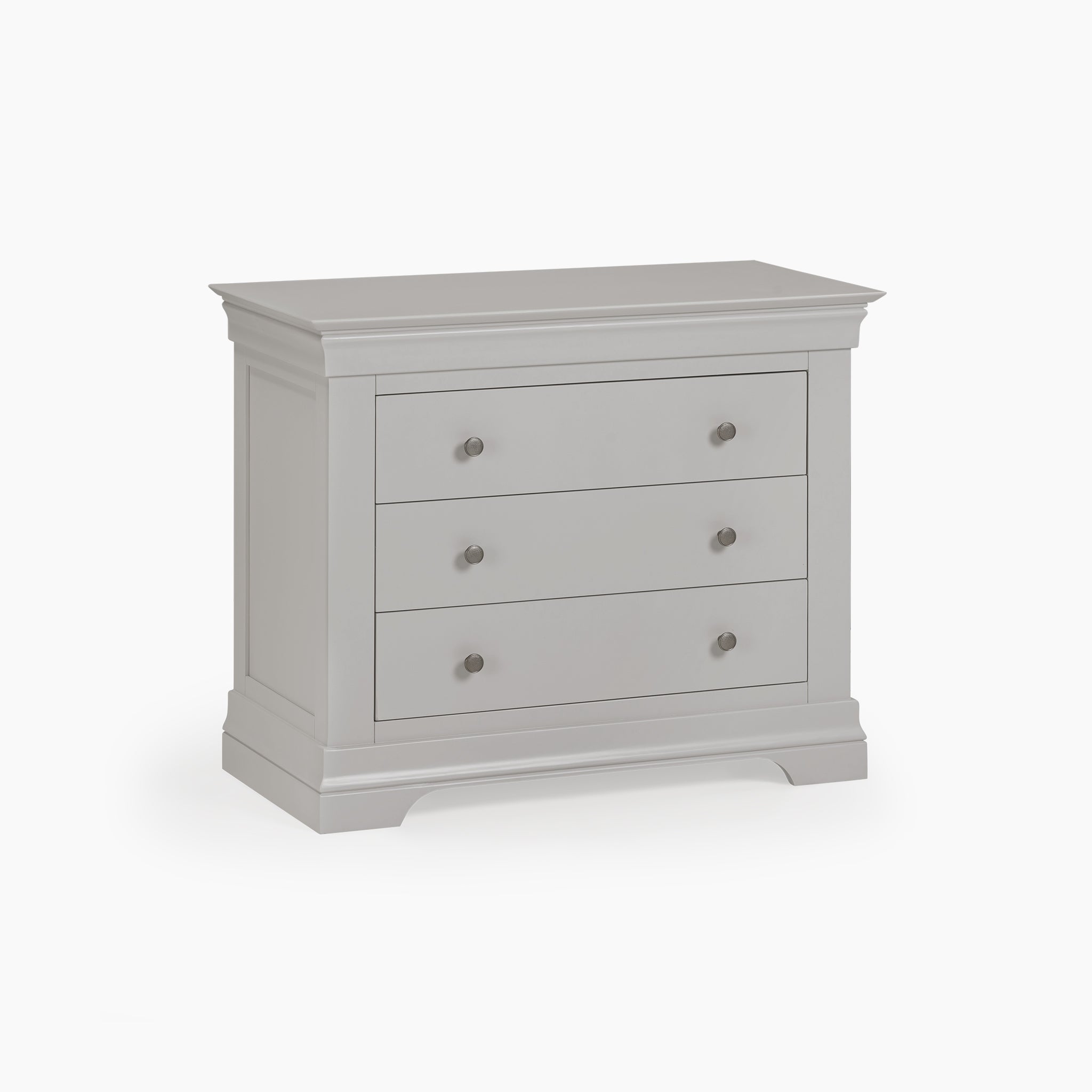 The Chalbury 3 Drawer Chest in Pebble Grey boasts three generous drawers with round handles, beautifully highlighting its storage furniture charm against a sleek white background.